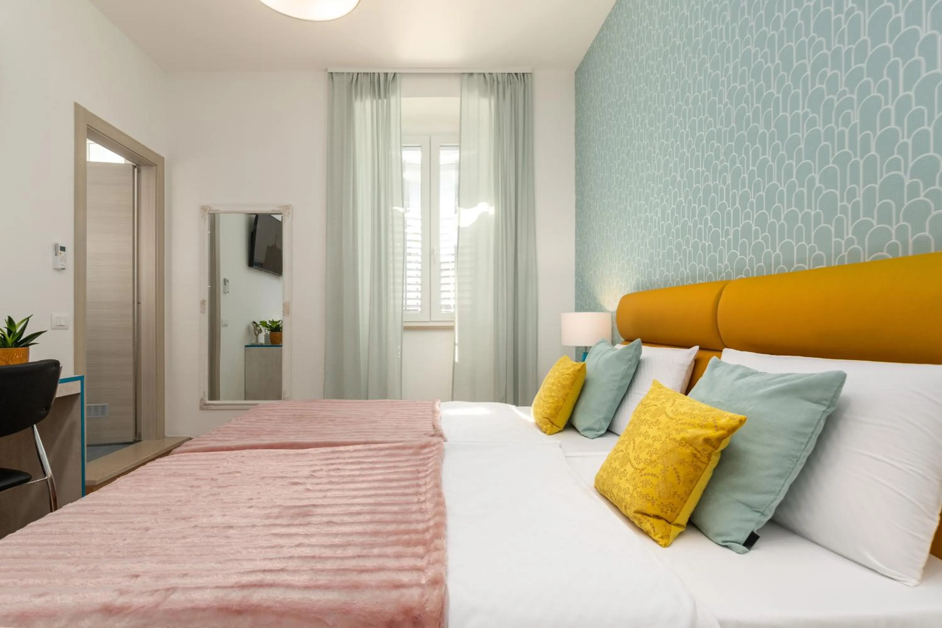 Bed in Polesana Rooms