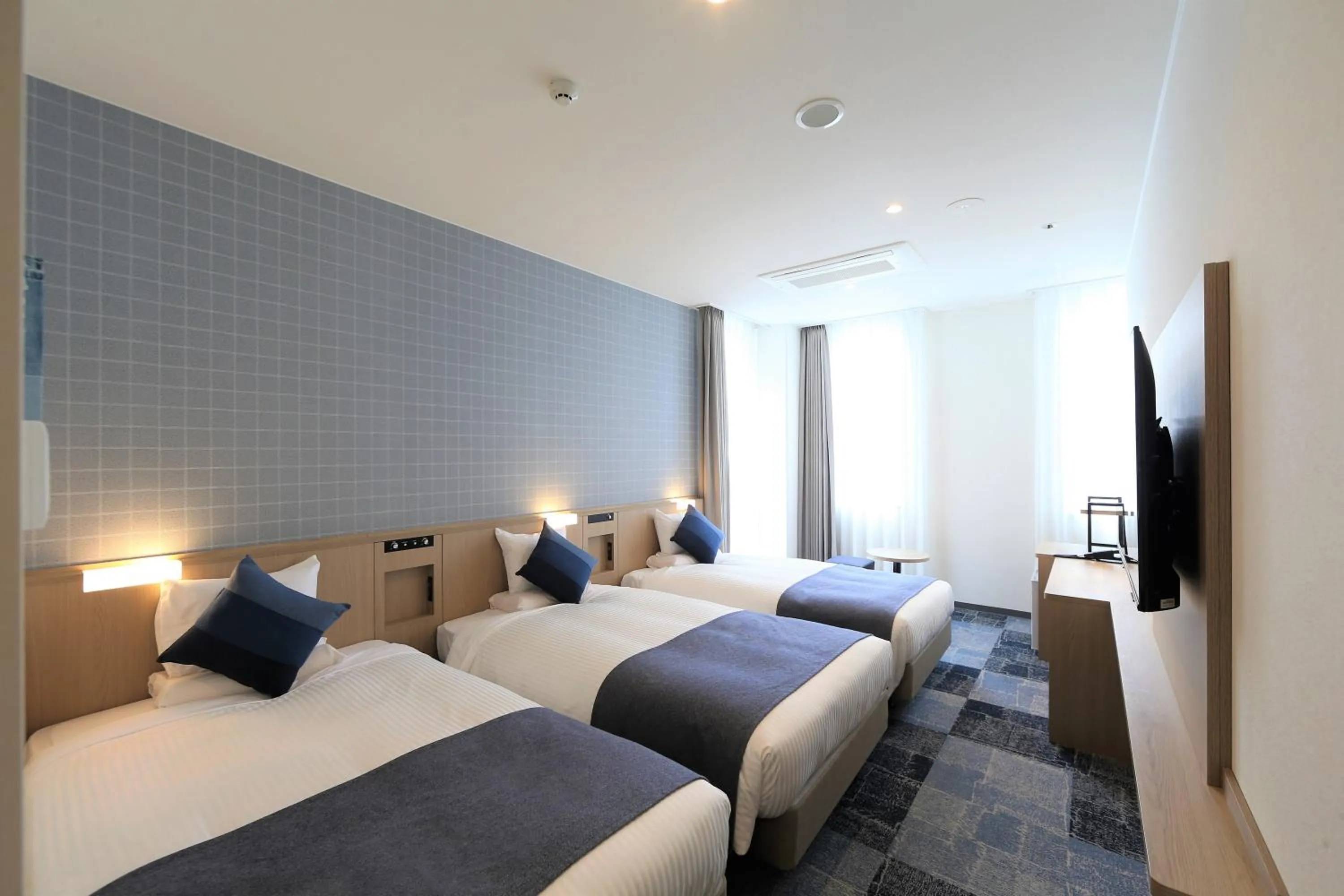 Photo of the whole room, Bed in HOTEL MYSTAYS Okayama