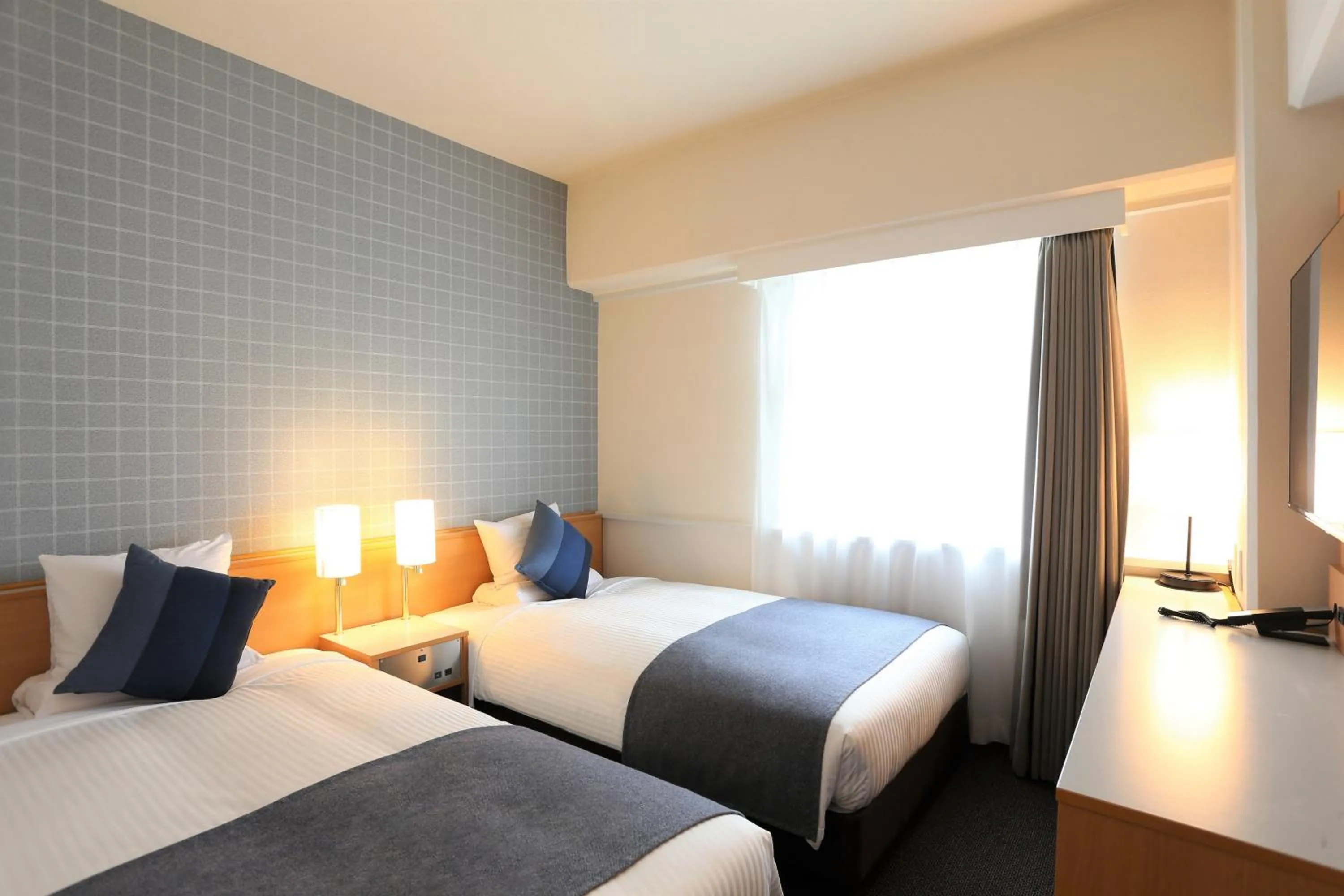 Photo of the whole room, Bed in HOTEL MYSTAYS Okayama