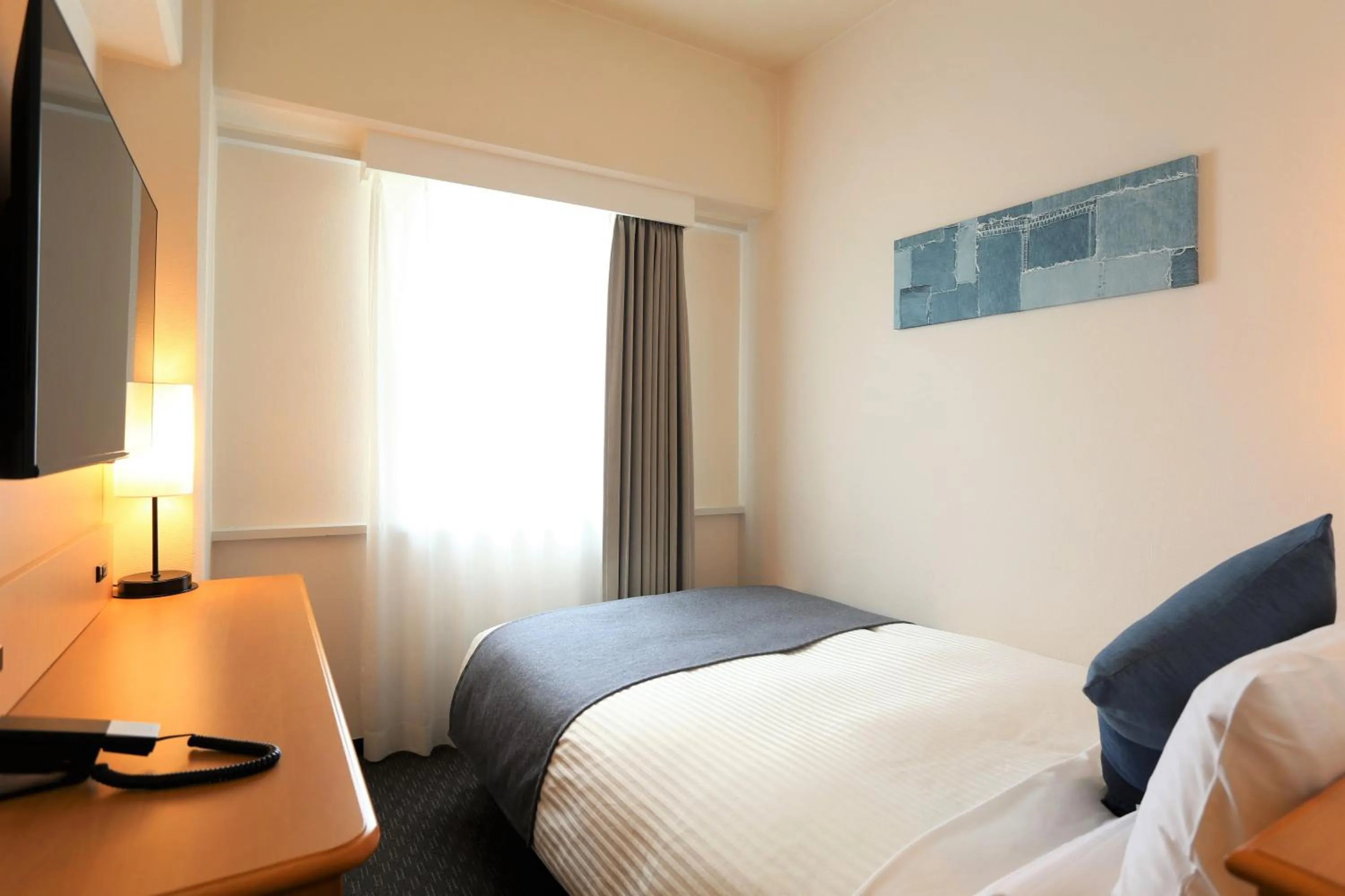 Photo of the whole room, Bed in HOTEL MYSTAYS Okayama
