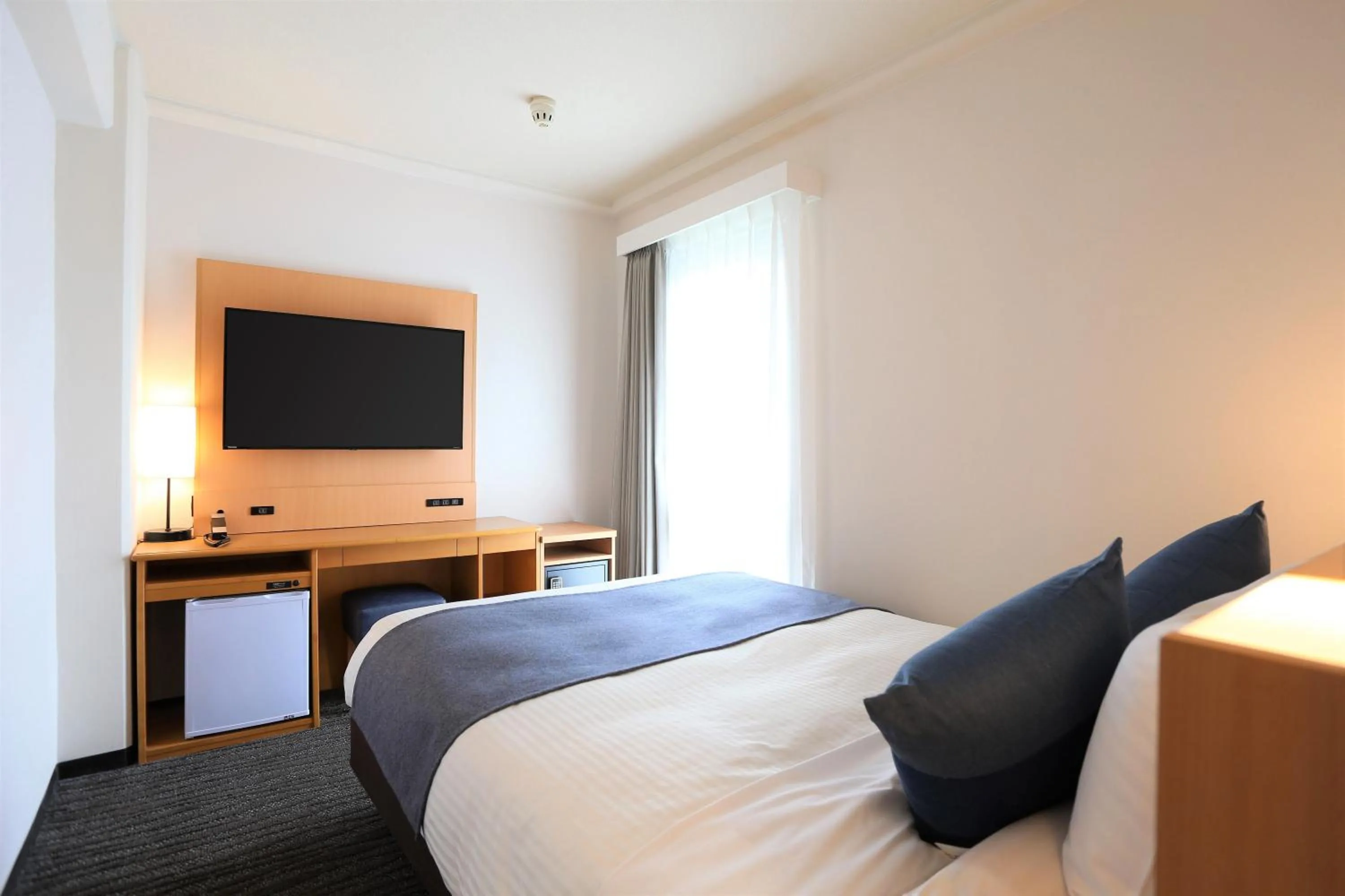 Photo of the whole room, Bed in HOTEL MYSTAYS Okayama