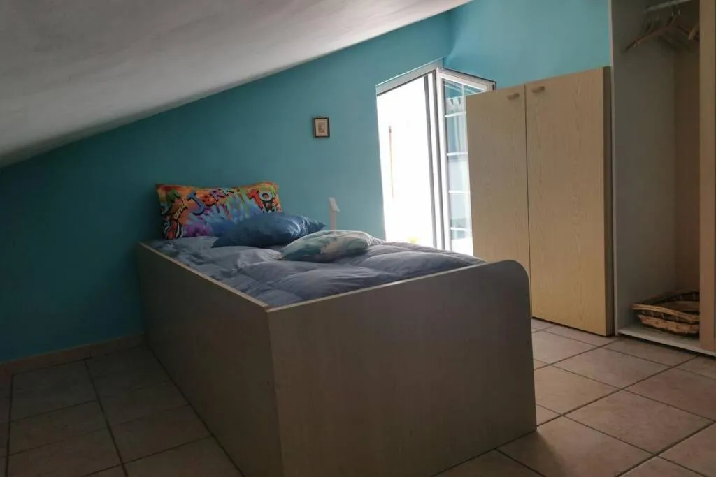 Bed in Alloggio turistico Id 14737 La mansarda Free Parking, wi-fi