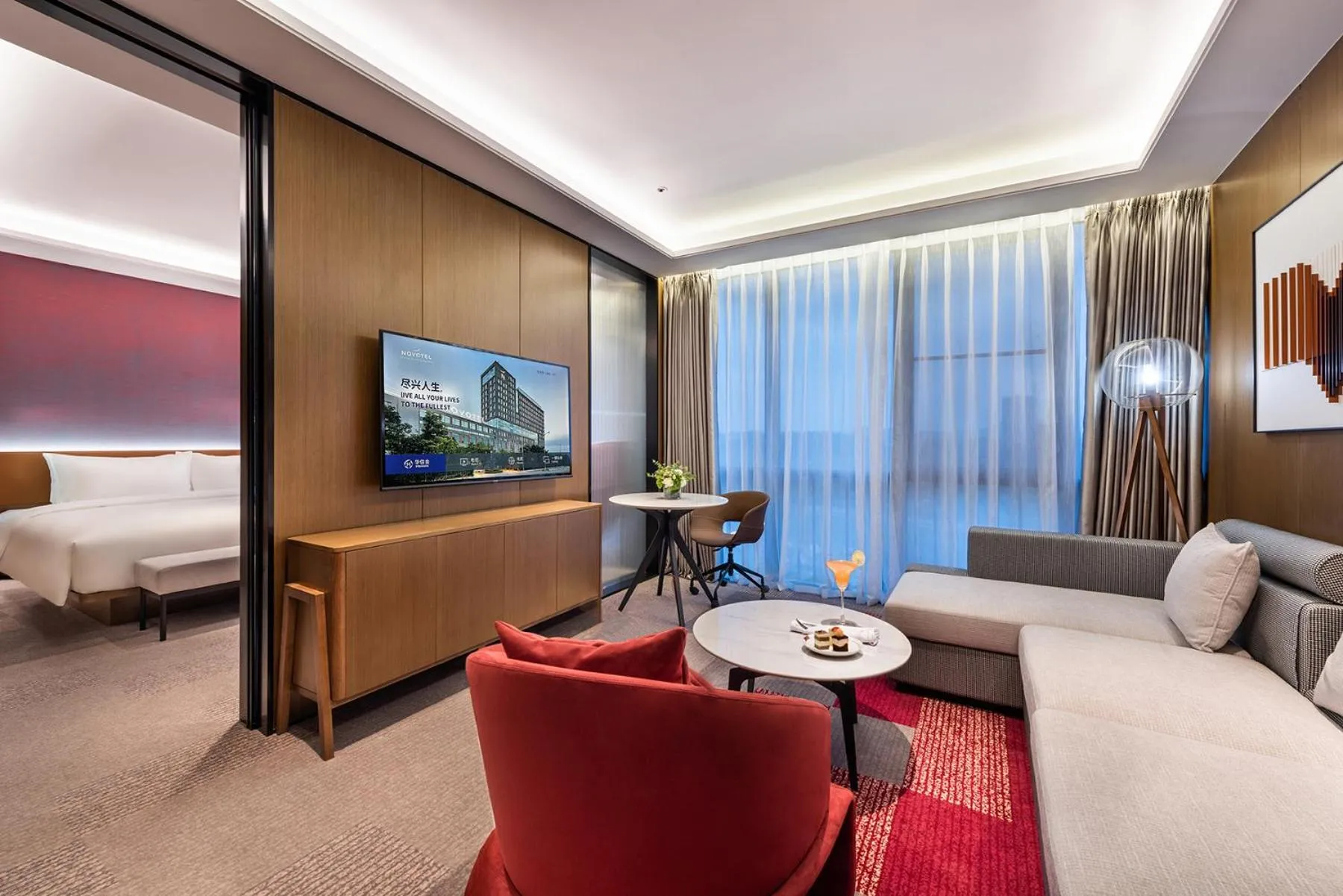 Living room, Bed in Novotel Dongguan Songshan