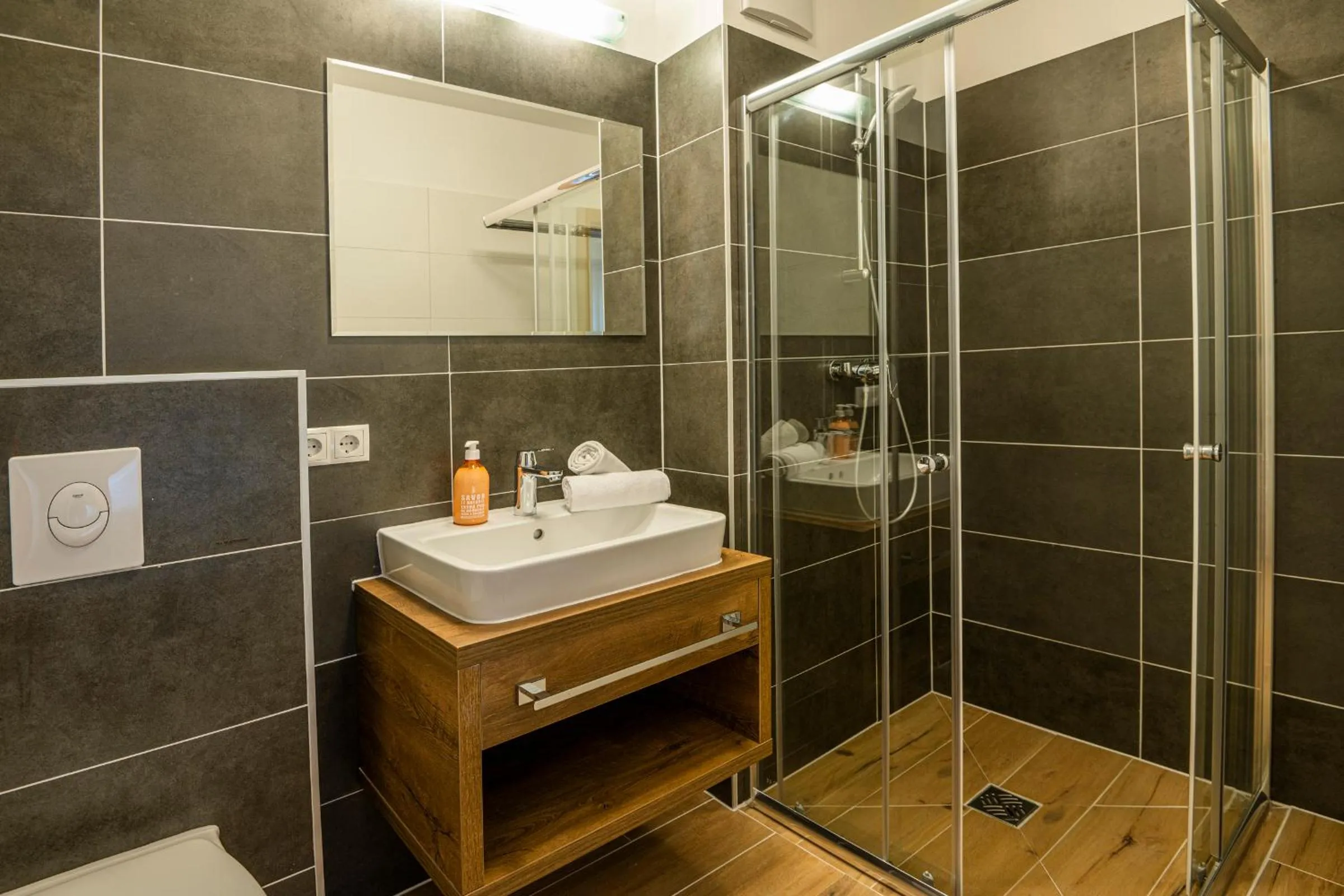 Bathroom in AlpenParks Hotel & Apartment Alpendorf