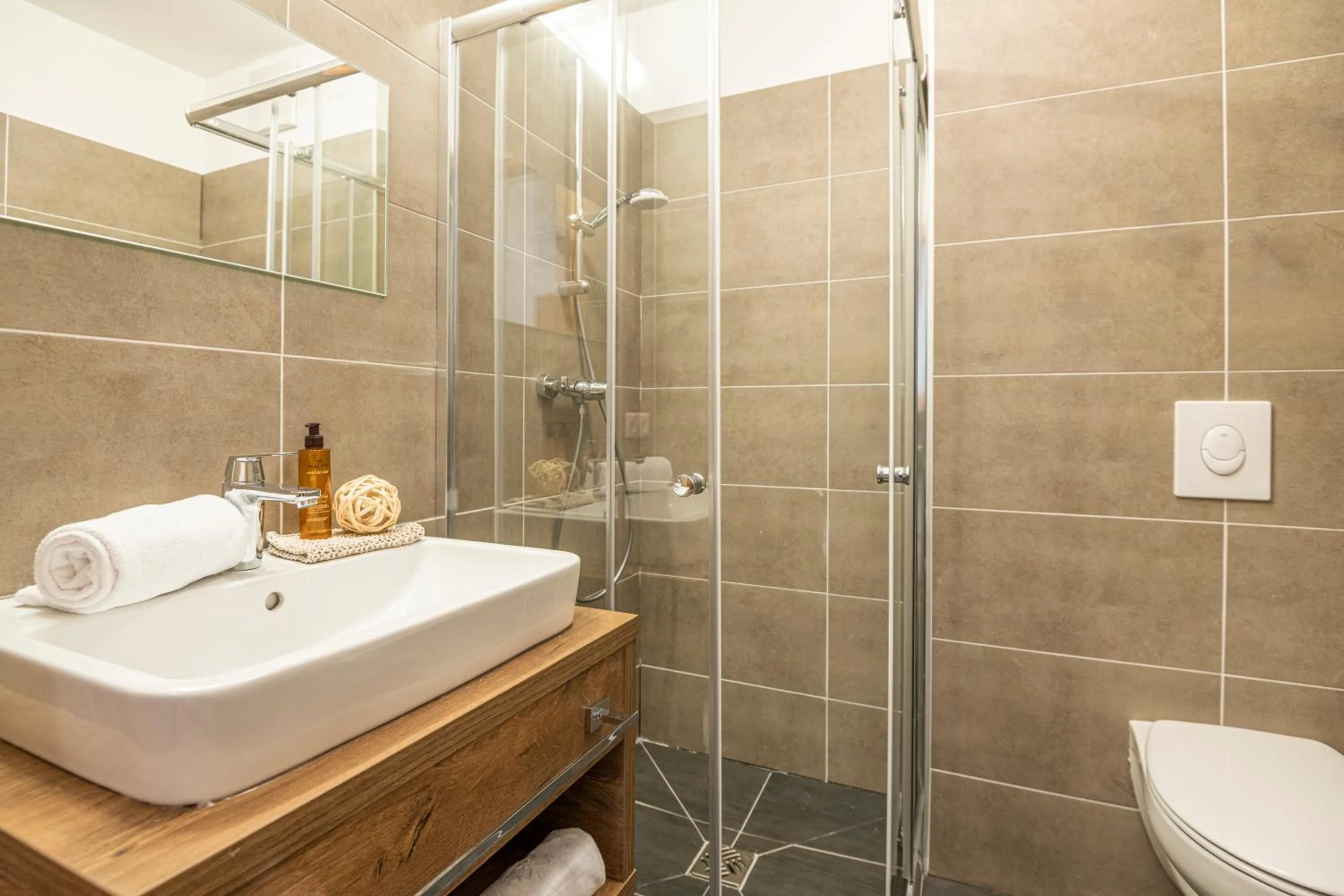 Bathroom in AlpenParks Hotel & Apartment Alpendorf