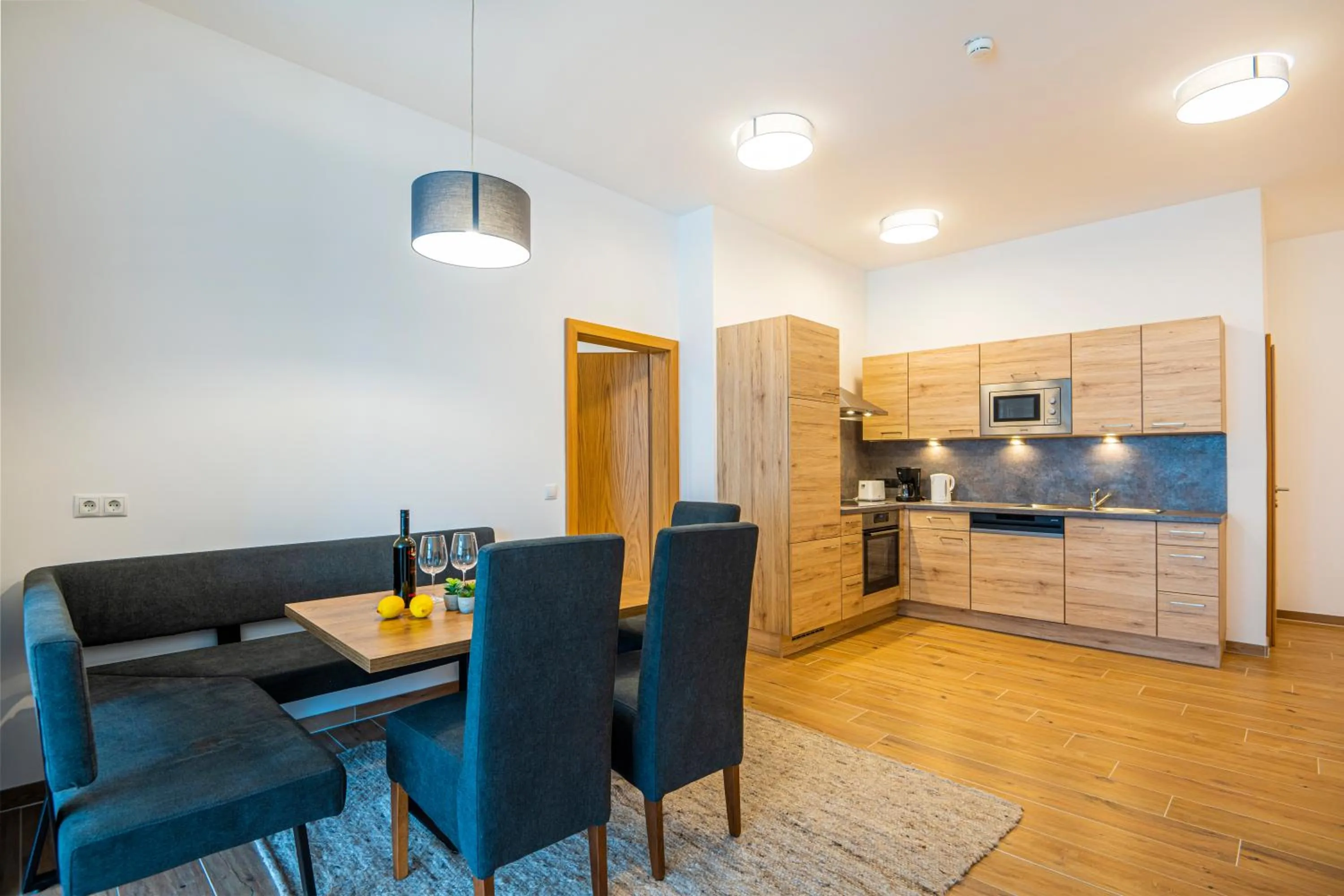 Kitchen or kitchenette in AlpenParks Hotel & Apartment Alpendorf