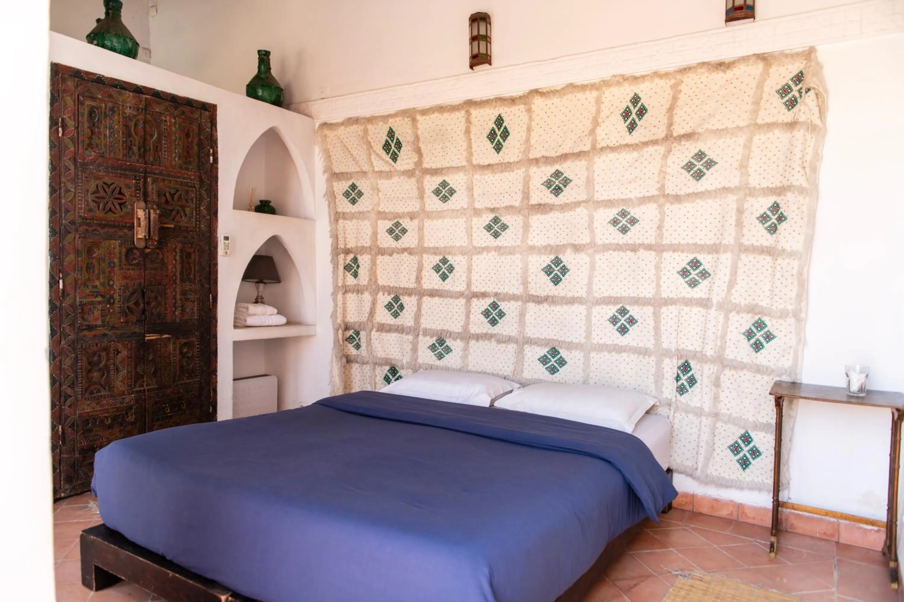 Bed in Riad Ben Youssef