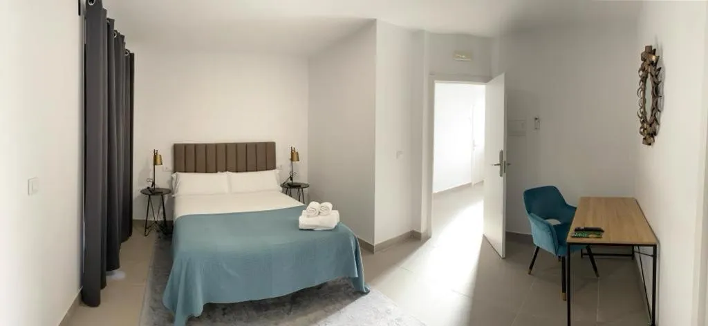 Bed in Villamarta Boutique Rooms
