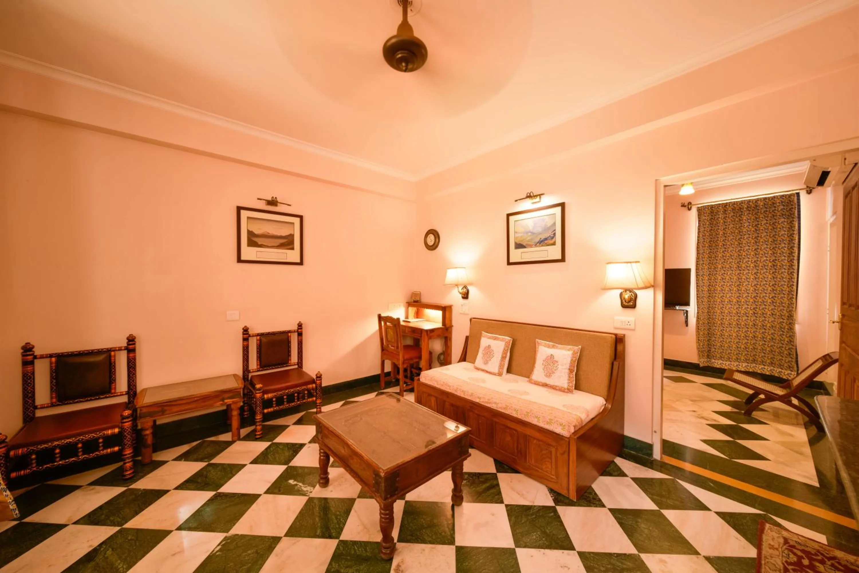 Seating area, Bed in Hotel Arya Niwas