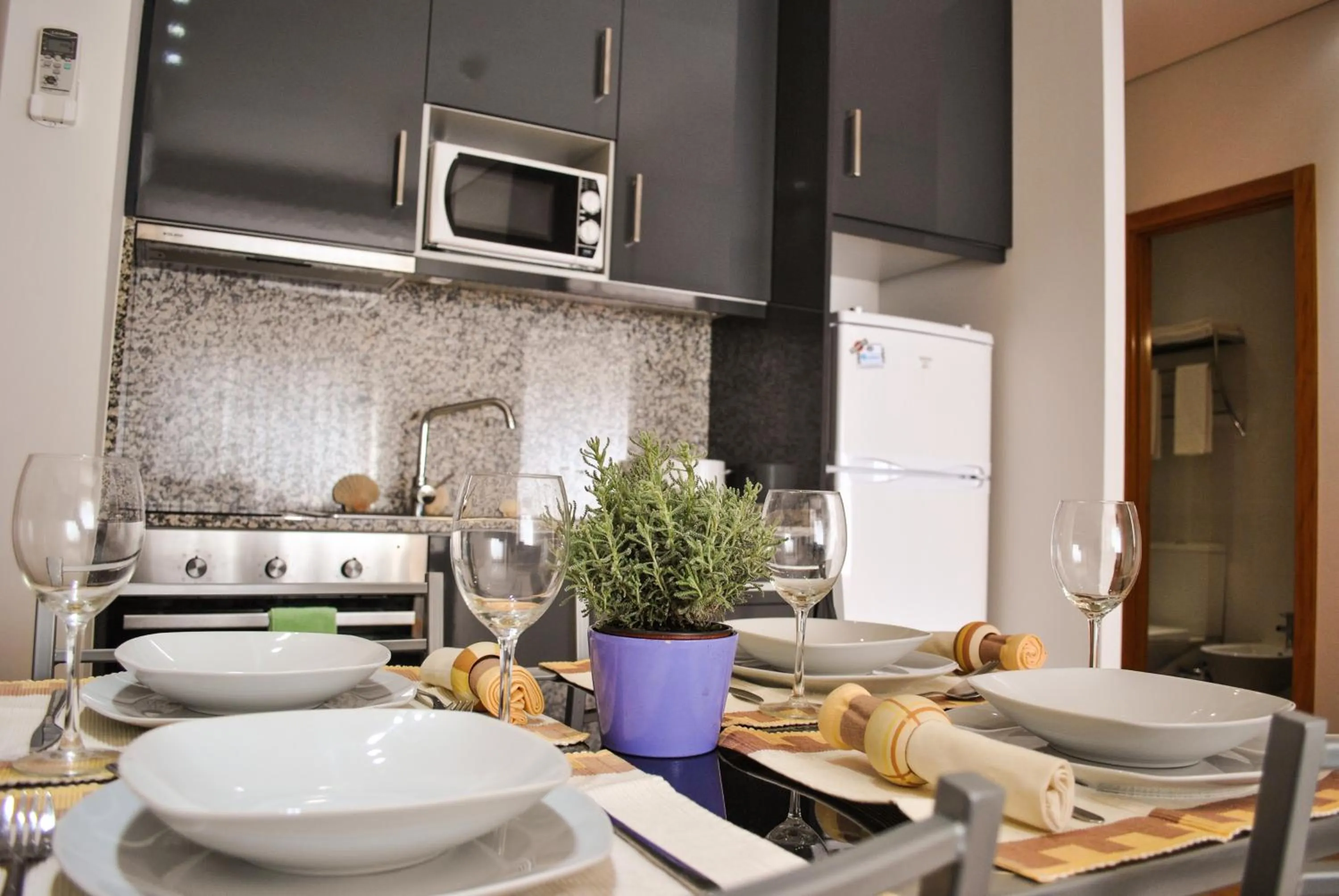 Kitchen or kitchenette in Apartamentos Portodouro - Santa Catarina