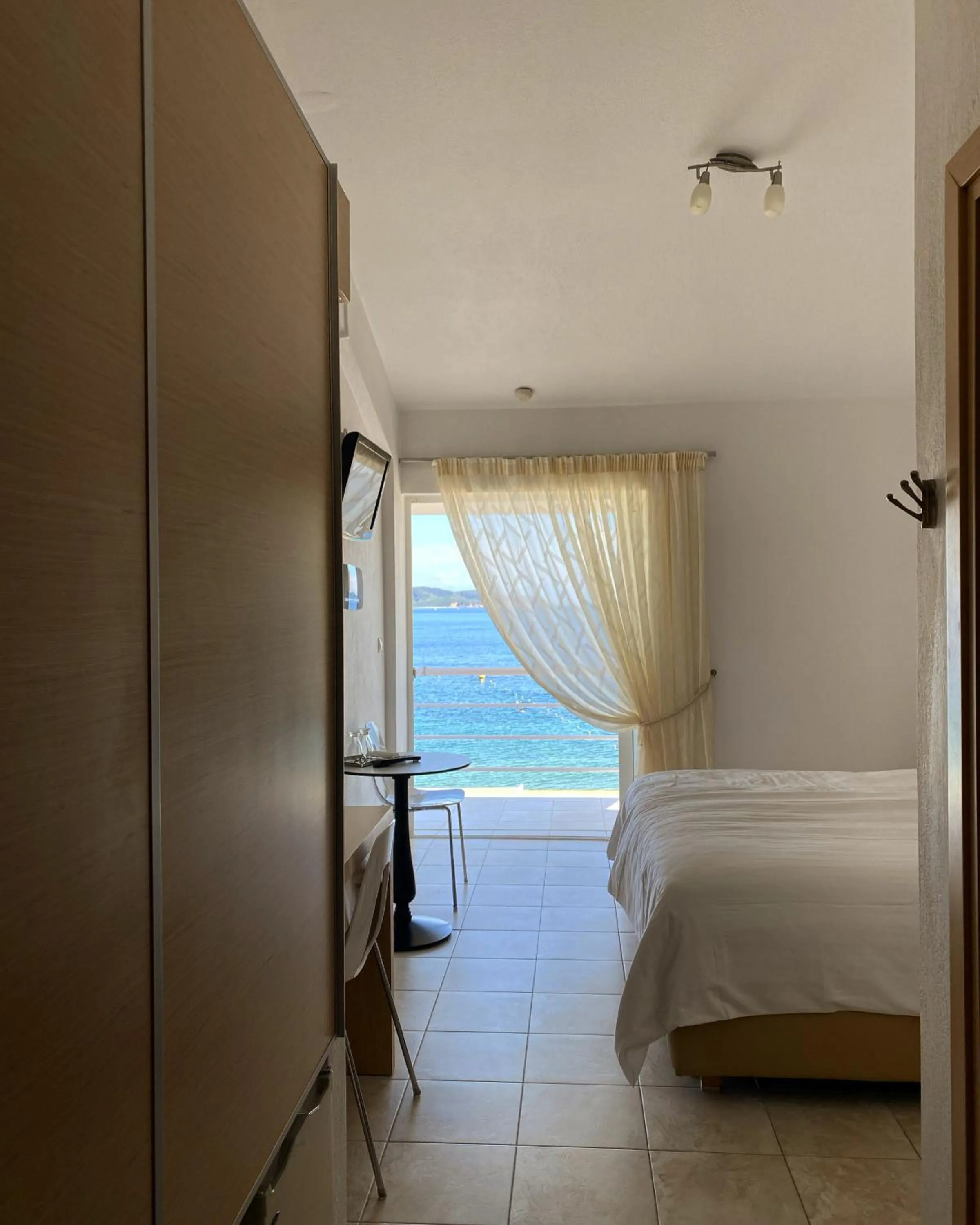 Bed in Anemoni Beach Hotel