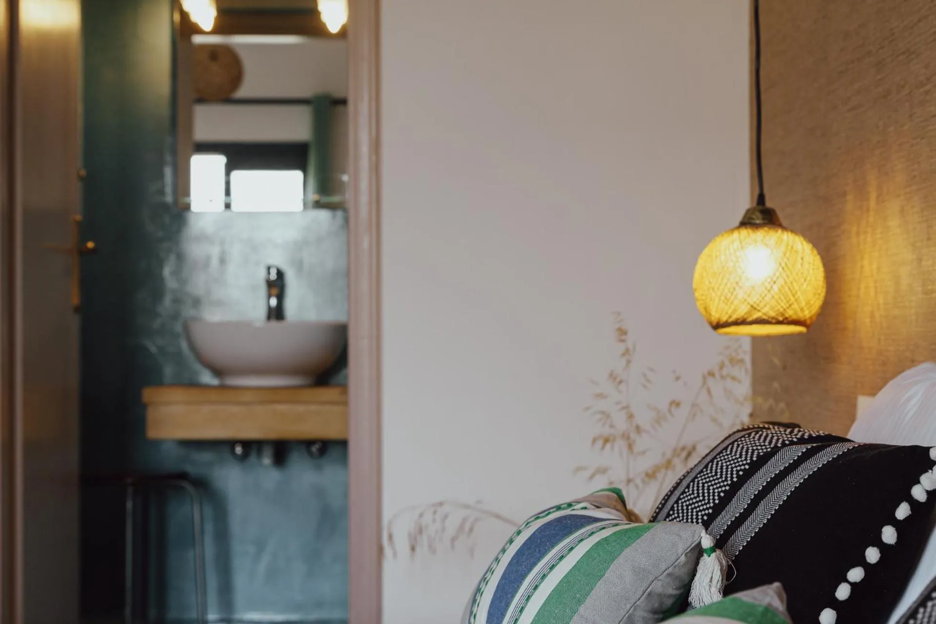 Bed in Anemos Inn by Estia