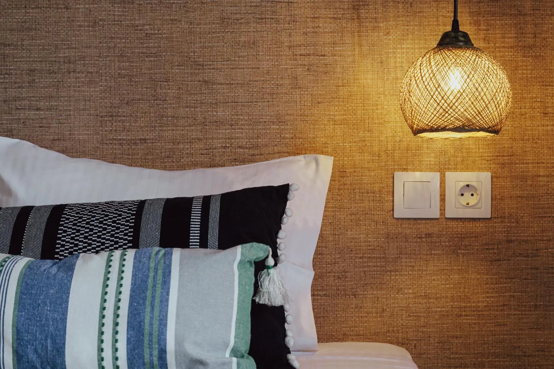 Decorative detail, Bed in Anemos Inn by Estia