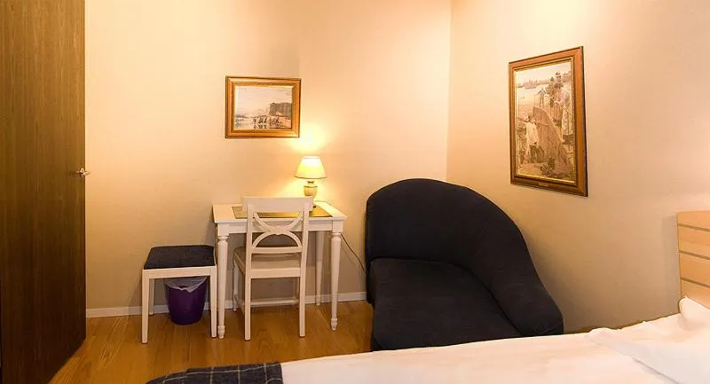 Seating area, Bed in Hotel Vännäs