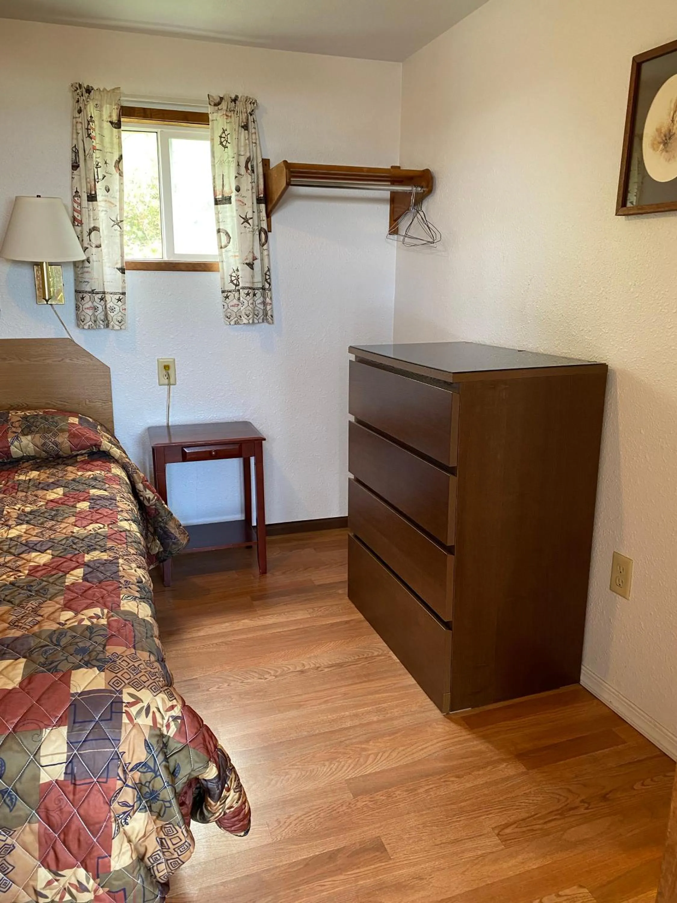 Bed in Oceanside Ocean Front Cabins