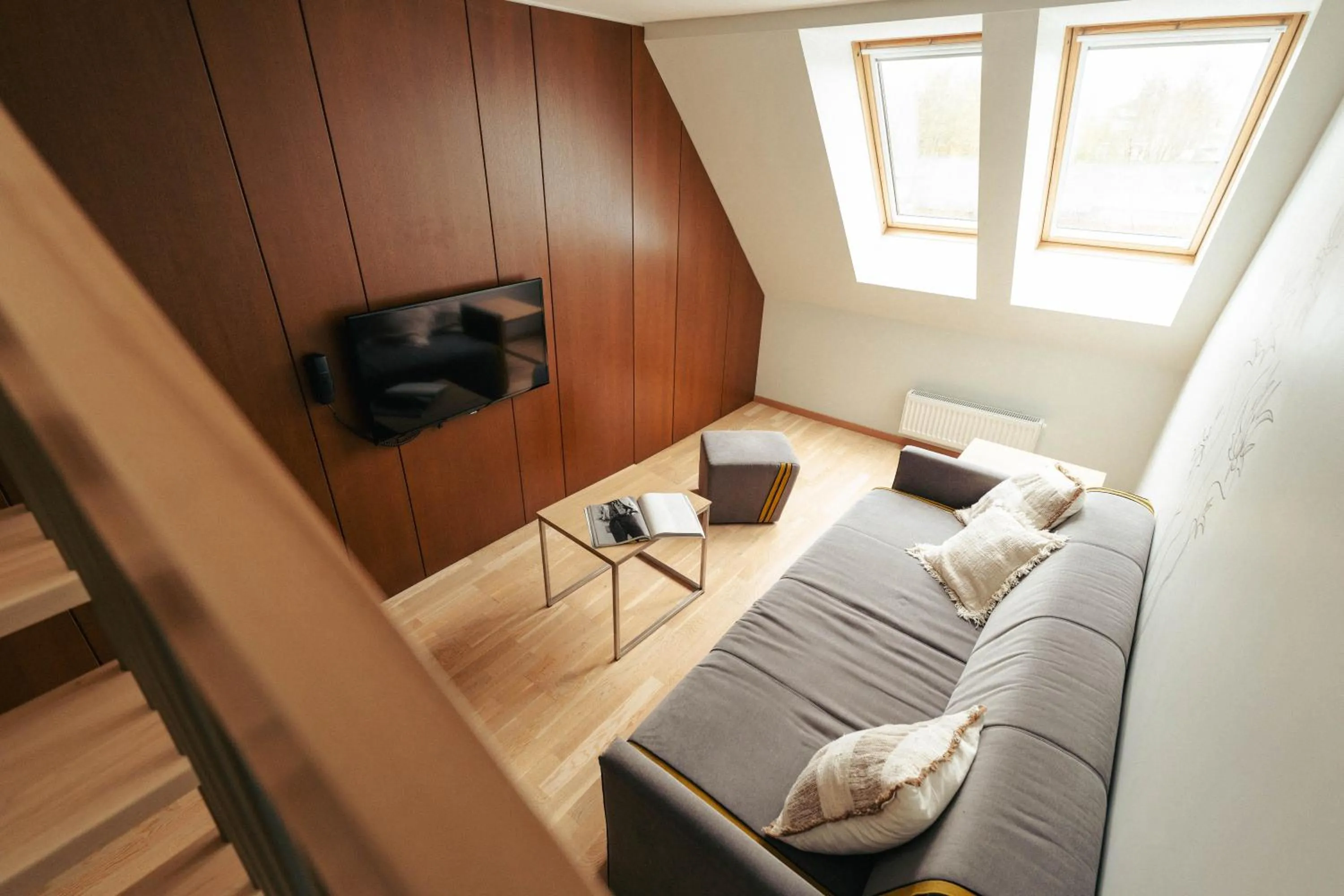 Communal lounge/ TV room in Mana Suites & Sea SPA