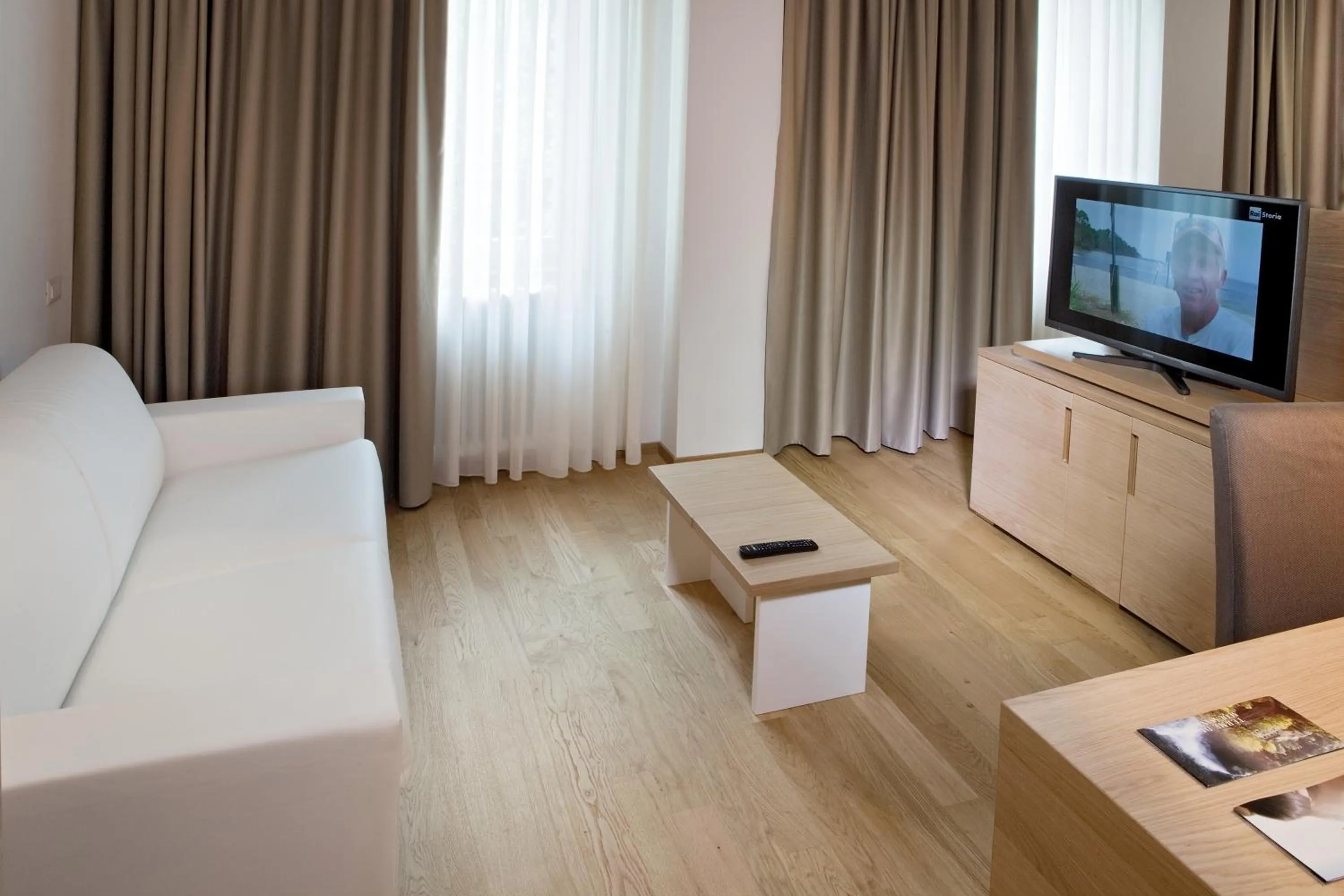 Living room, Bed in Terme di Acquasanta Hotel Italia & Spa