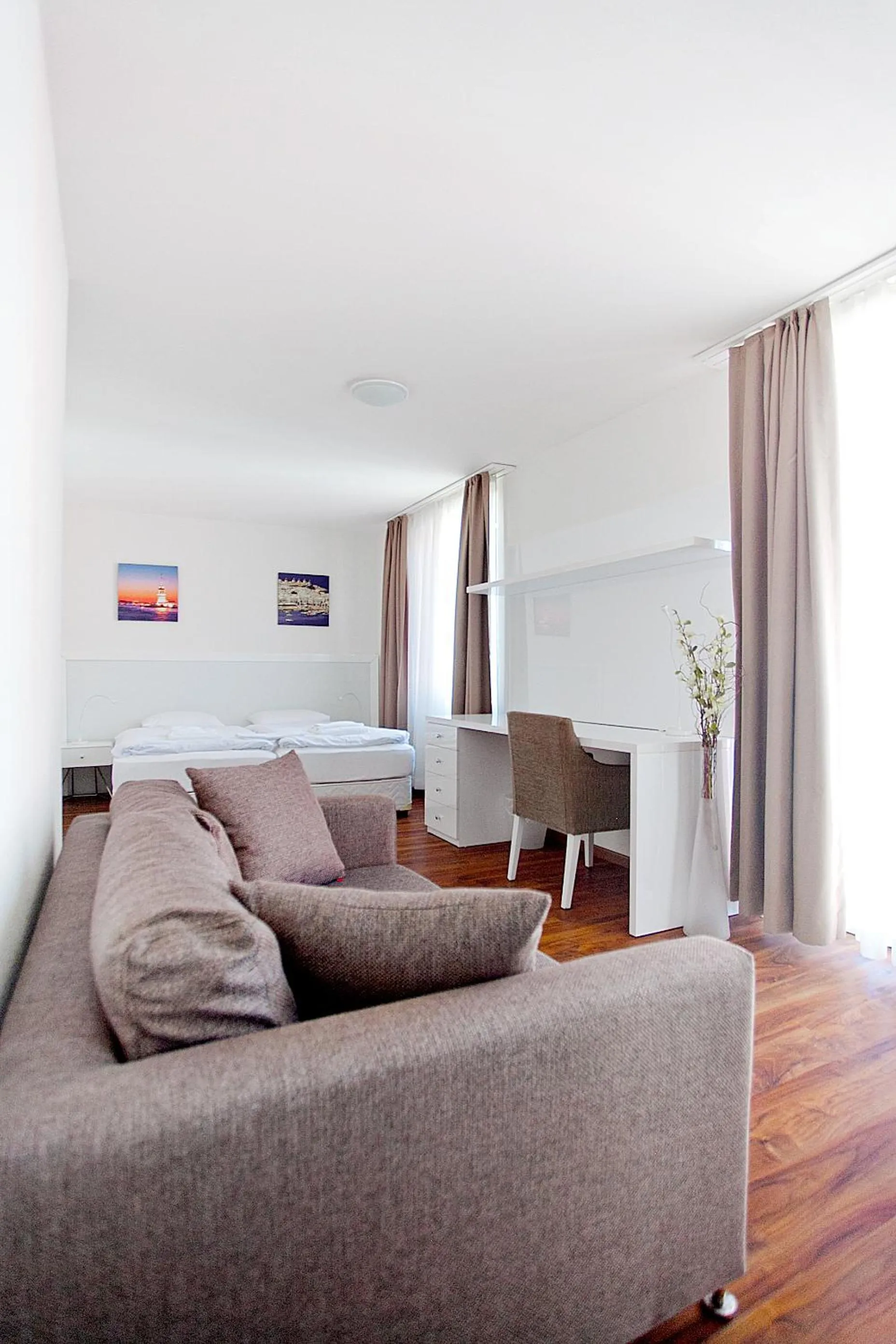 Seating area in Premium Apartments by Livingdowntown