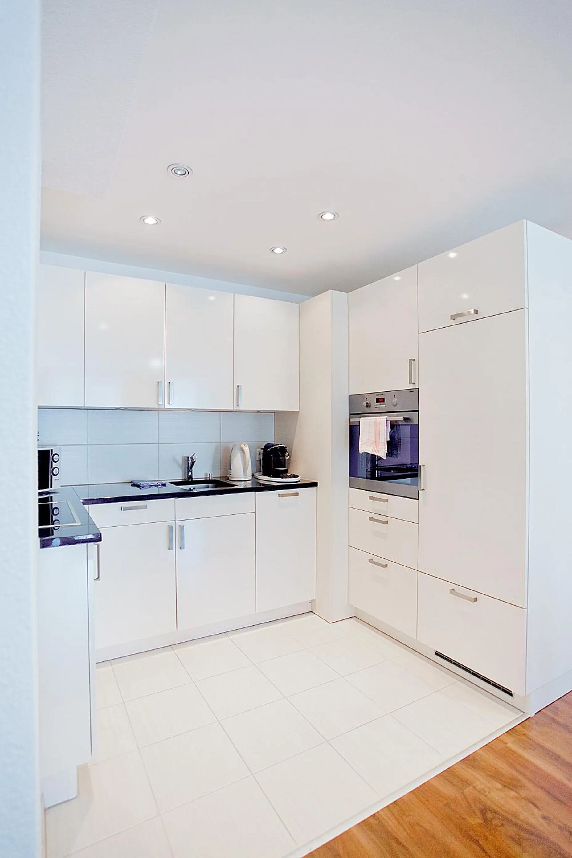 Kitchen or kitchenette in Premium Apartments by Livingdowntown