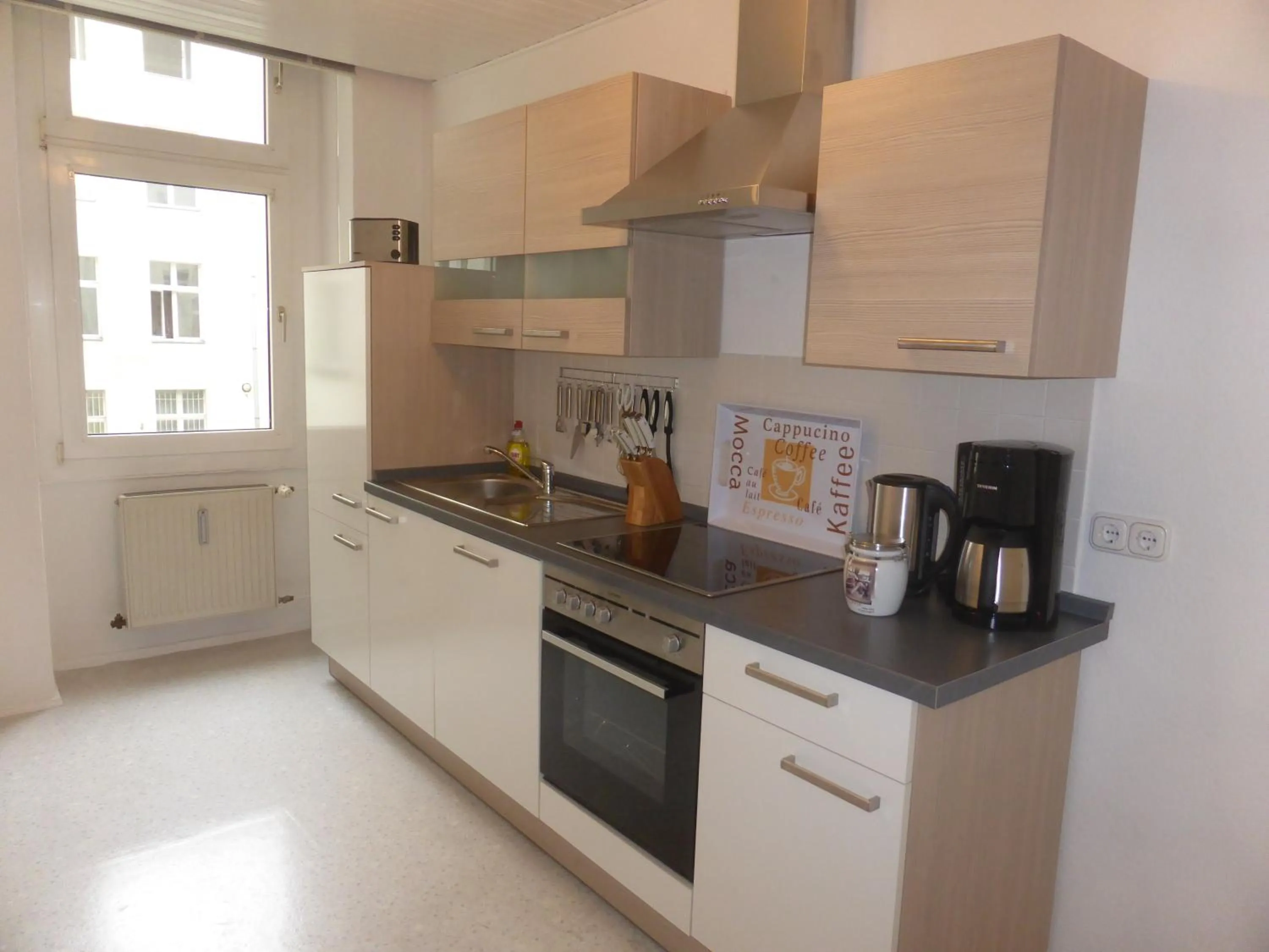 Kitchen or kitchenette in Apartments Dahlie & Nelke