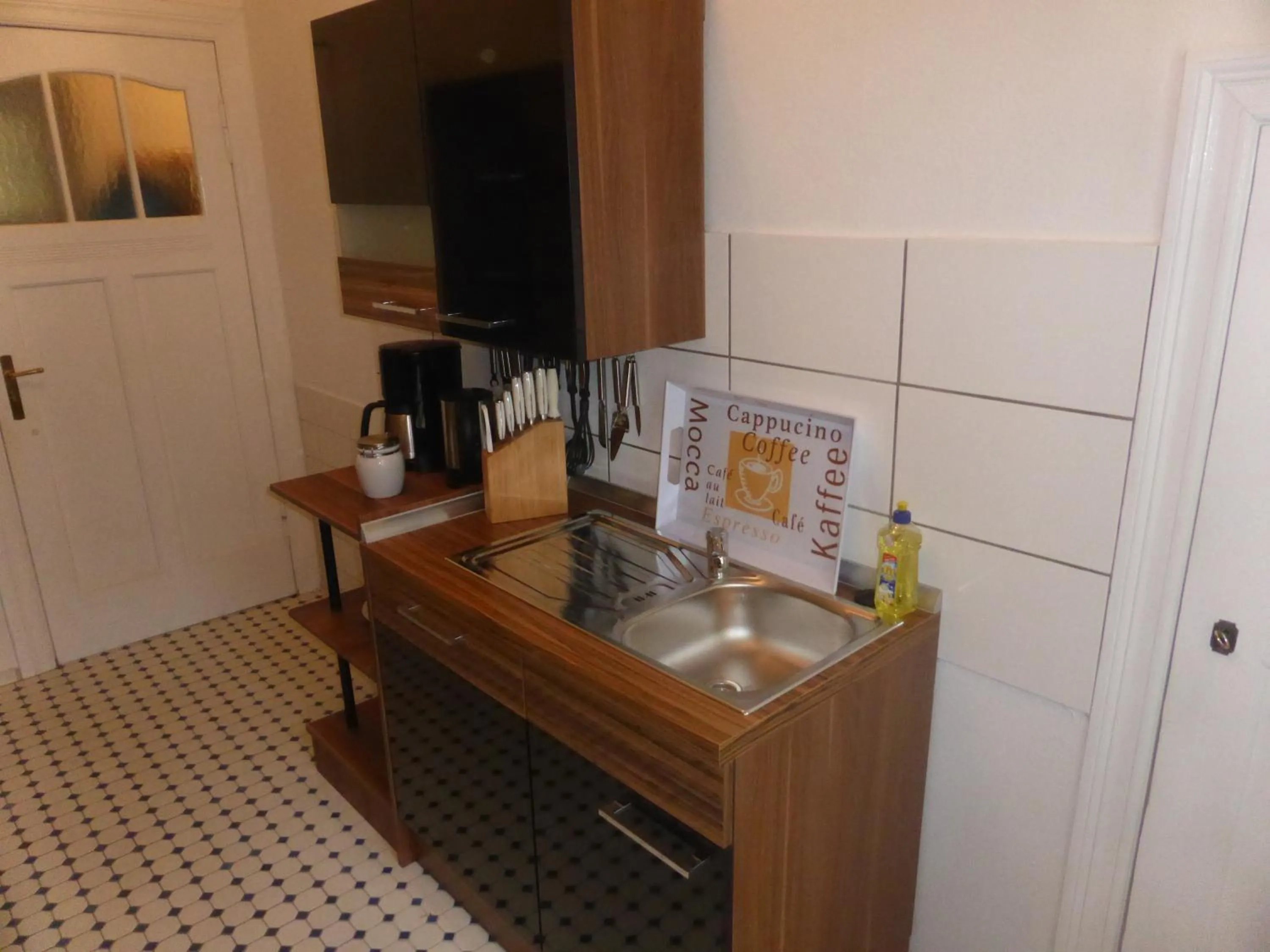 Kitchen or kitchenette in Apartments Dahlie & Nelke