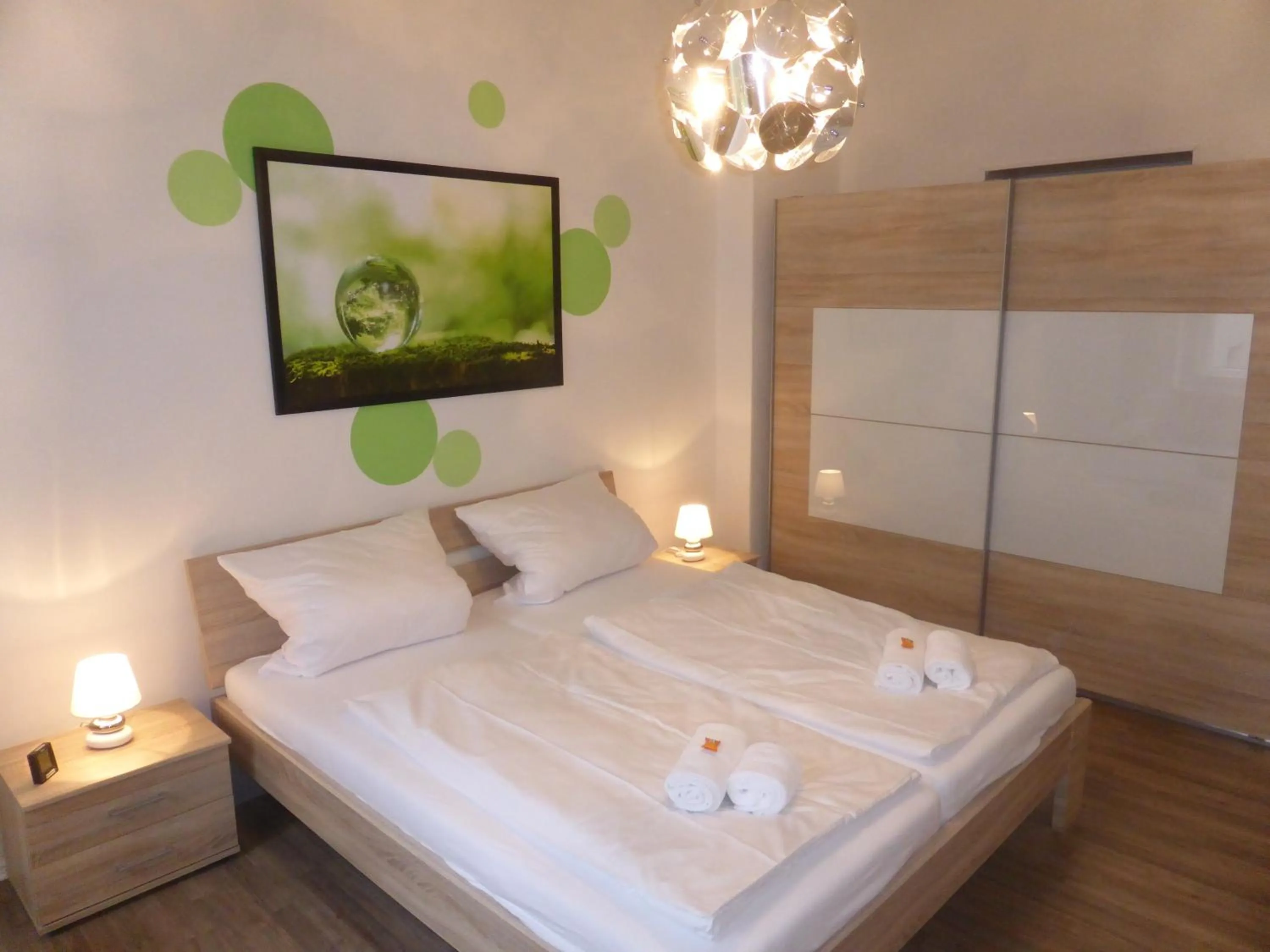 Bed in Apartments Dahlie & Nelke