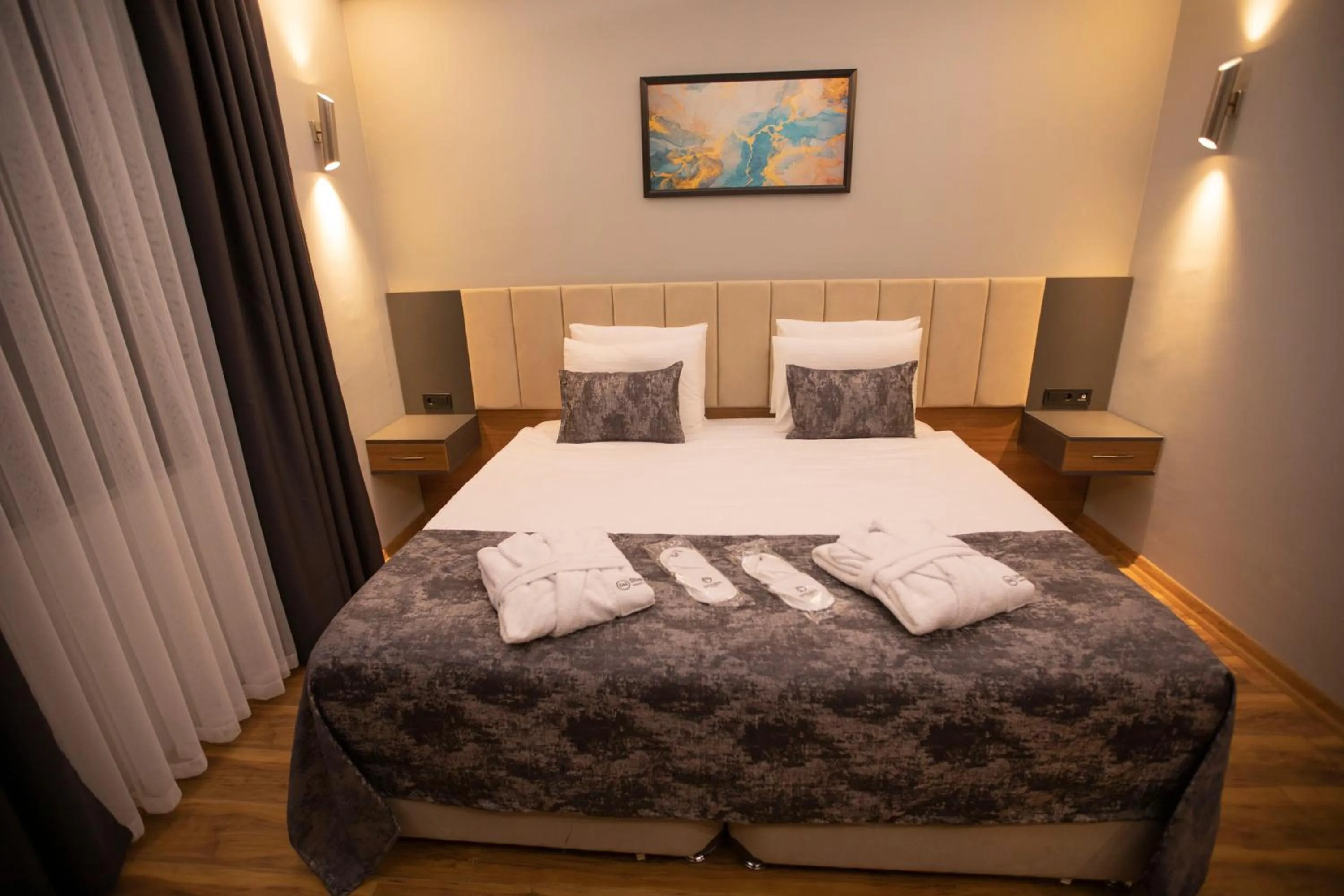 Bed in Divares Luxury Hotel