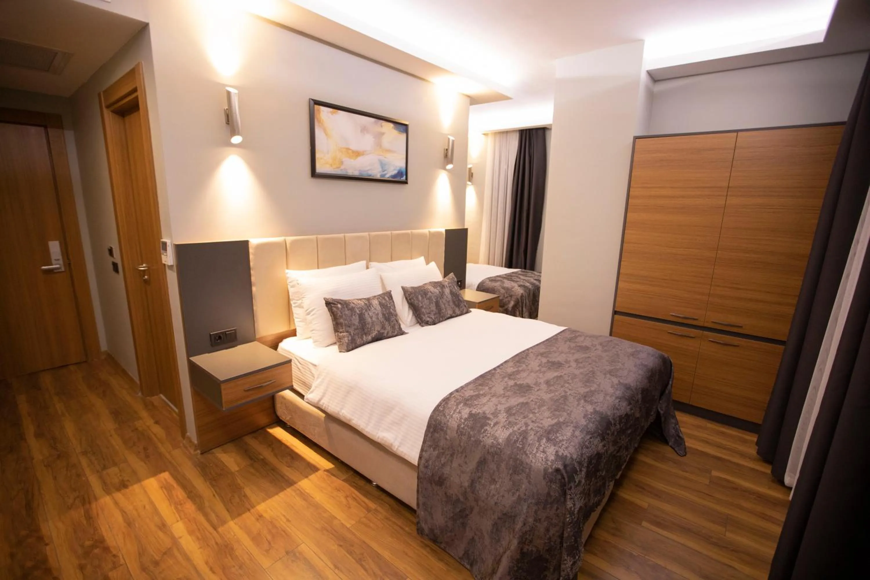 Bed in Divares Luxury Hotel