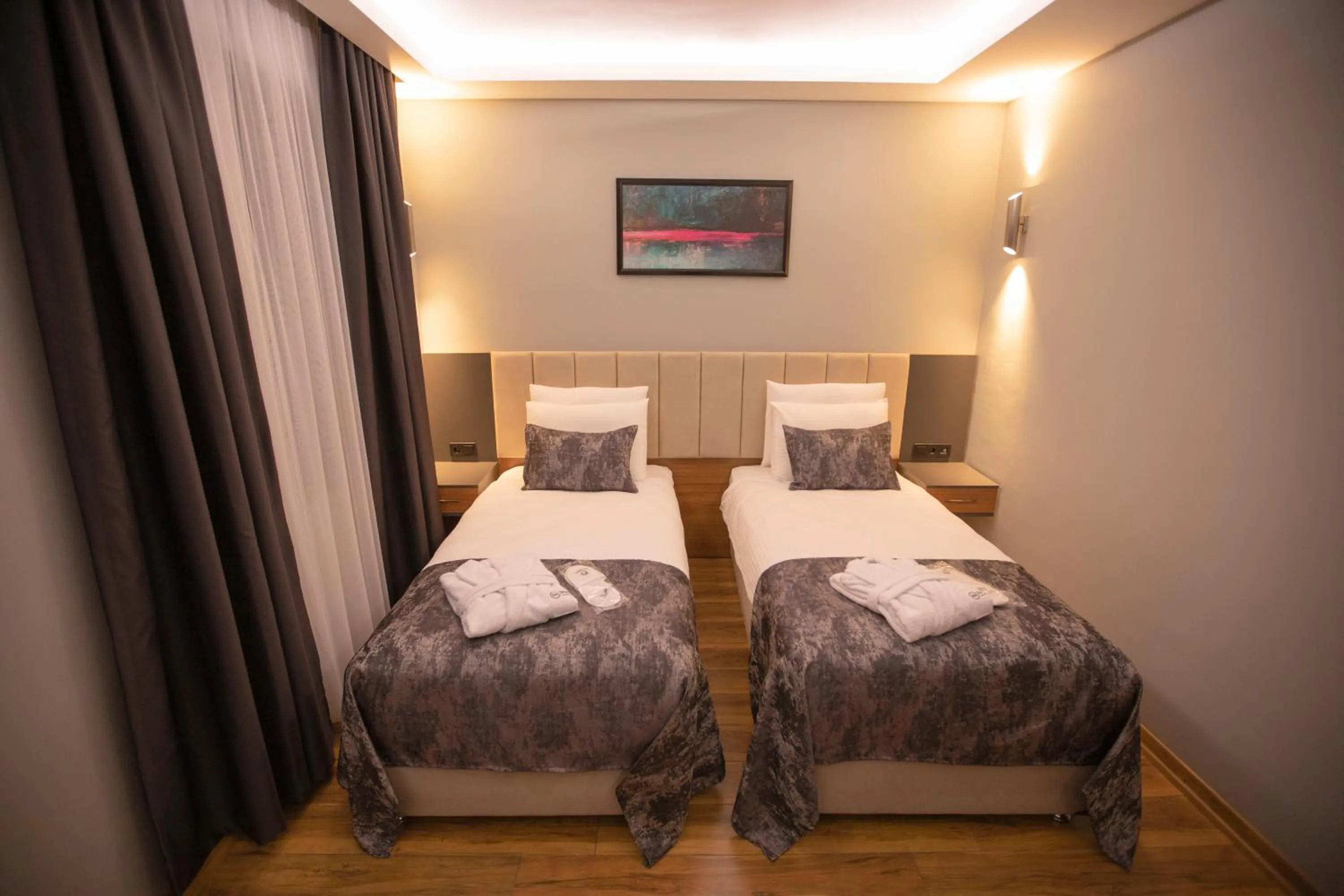 Bed in Divares Luxury Hotel