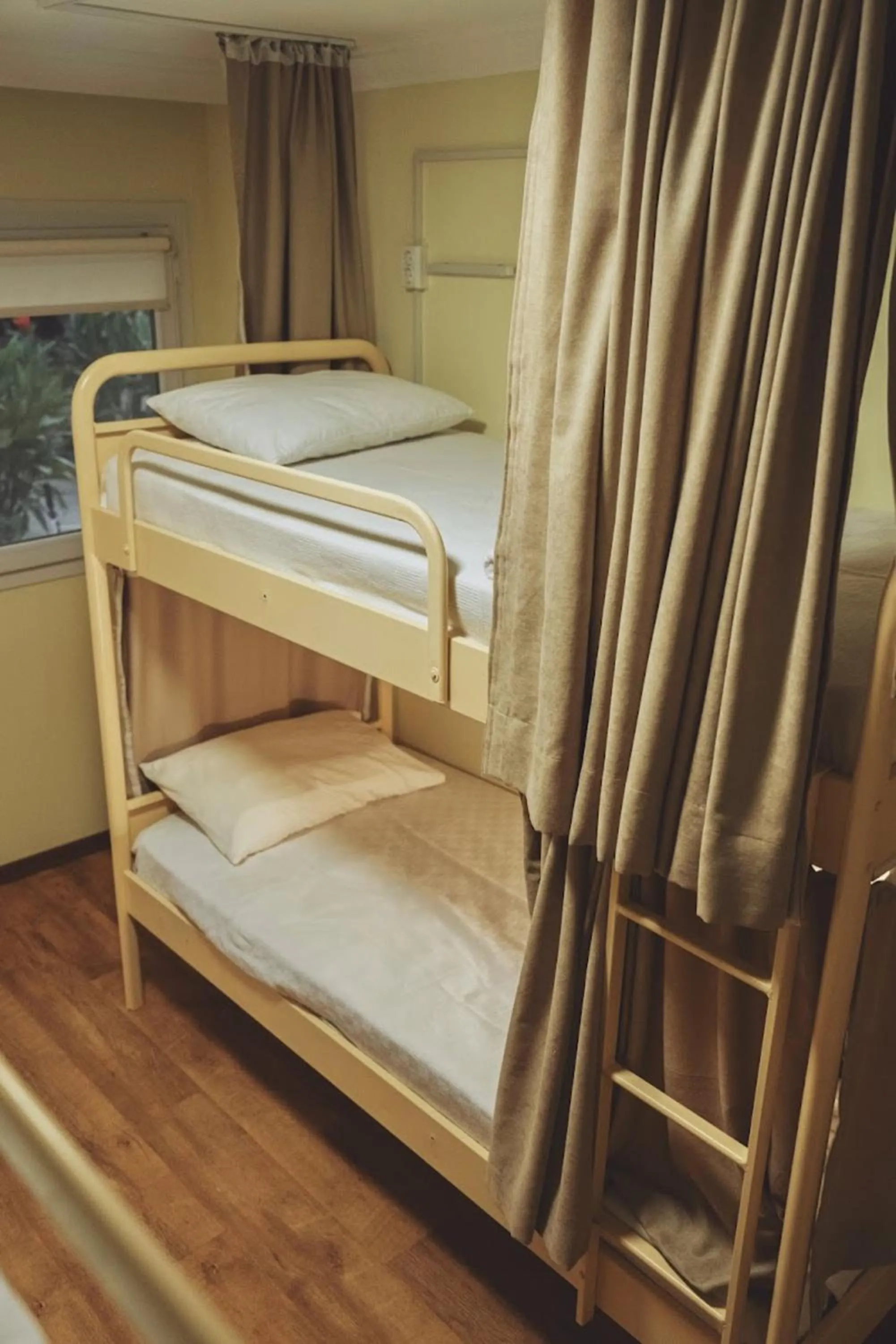 Bed in ORANGE BEACH CAMP