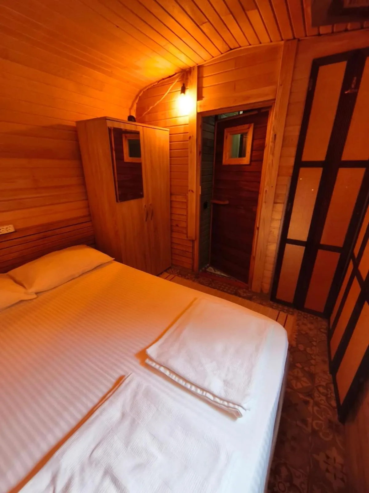 Bed in ORANGE BEACH CAMP