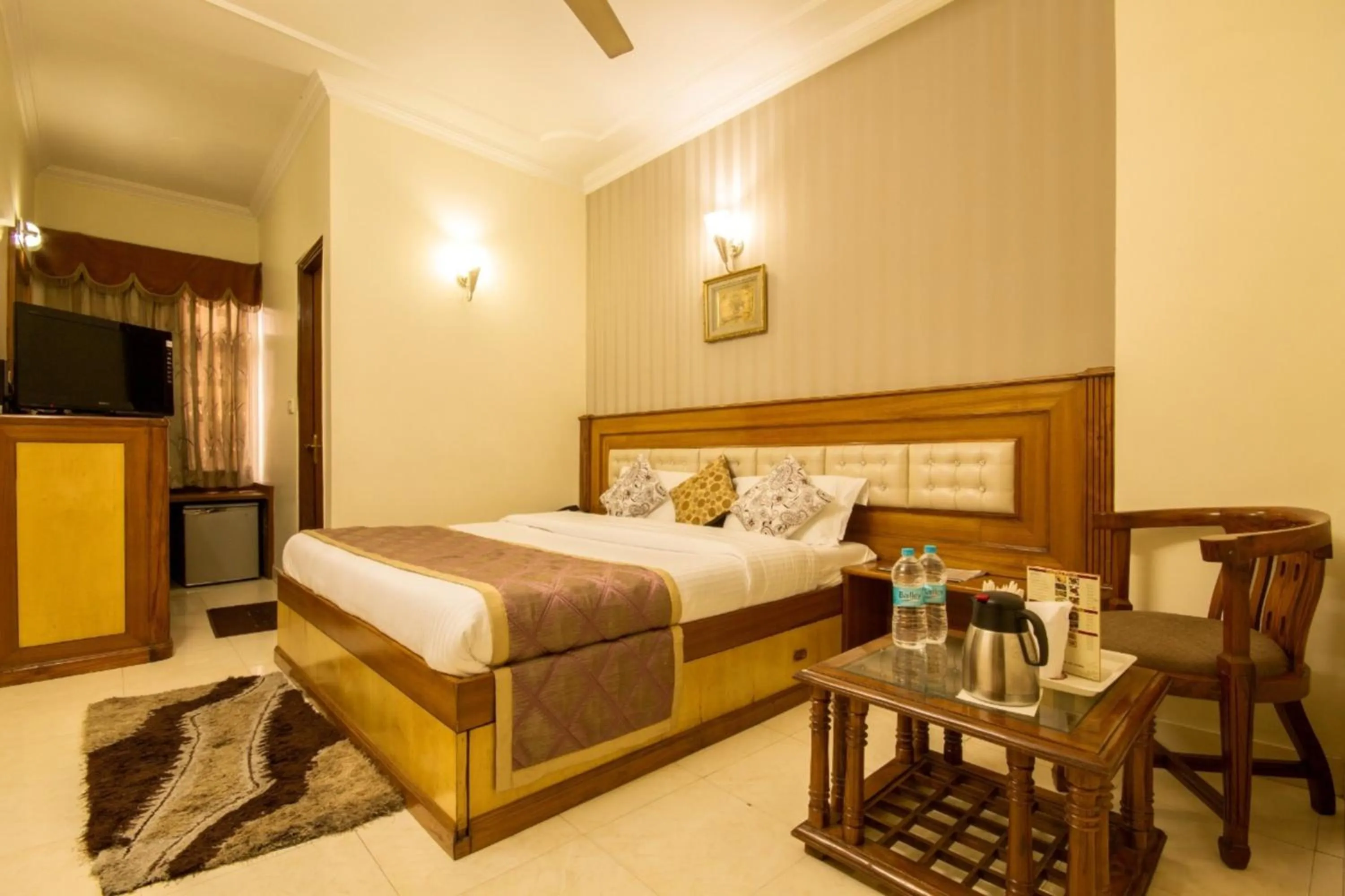 Living room, Bed in The C Park Inn Karol Bagh Homely Atmosphere