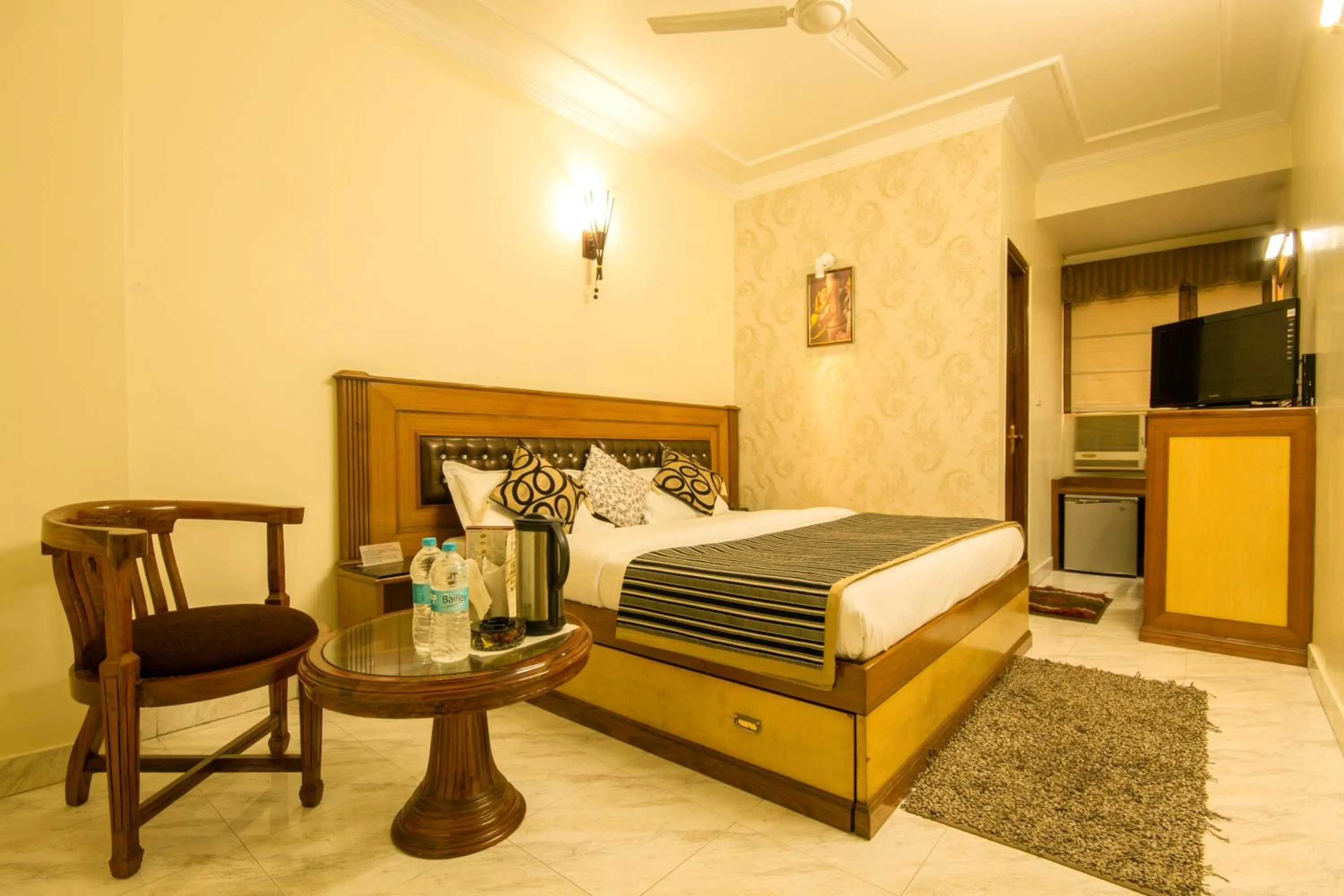 Photo of the whole room, Bed in The C Park Inn Karol Bagh Homely Atmosphere