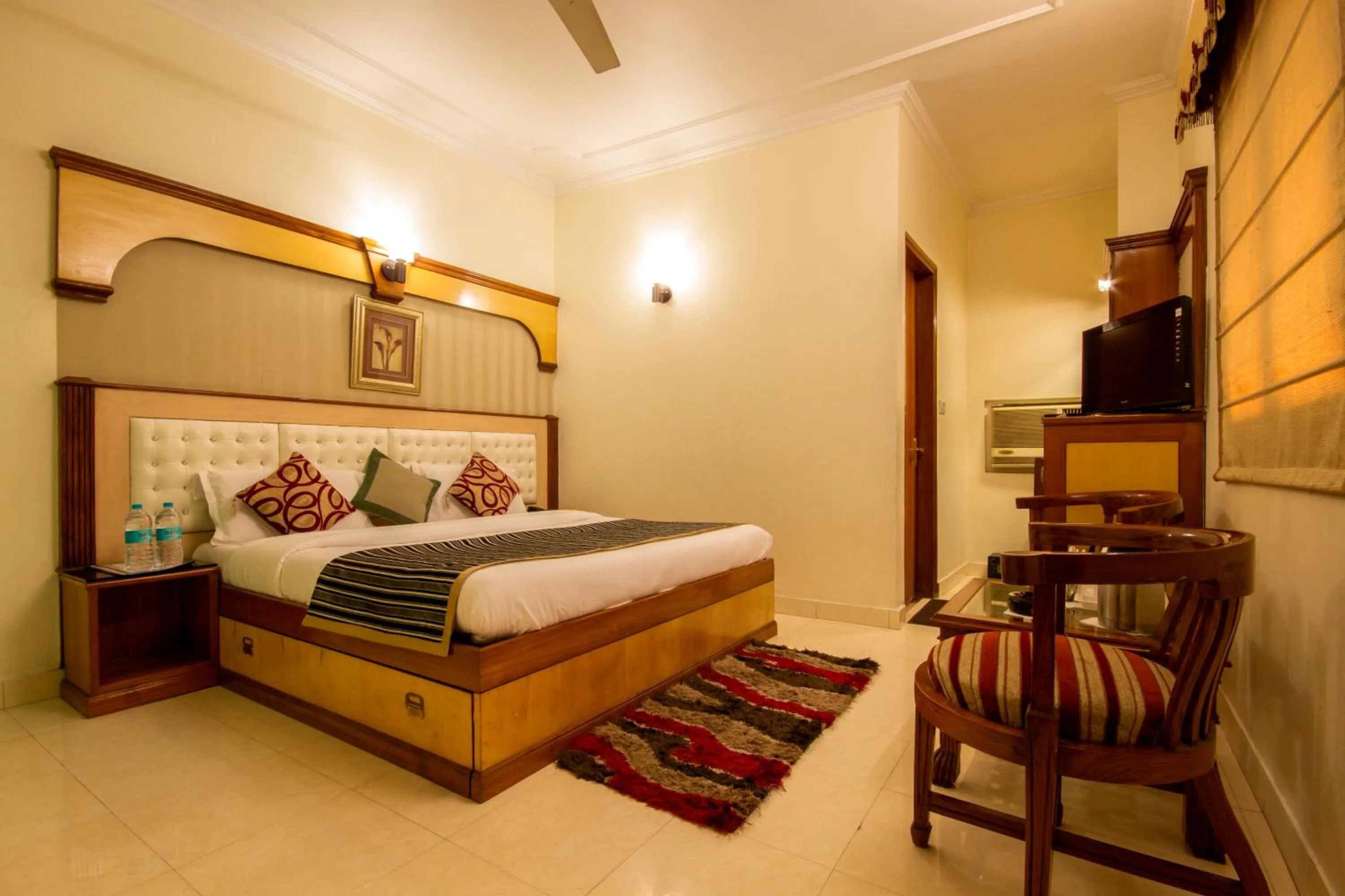 Bed in The C Park Inn Karol Bagh Homely Atmosphere