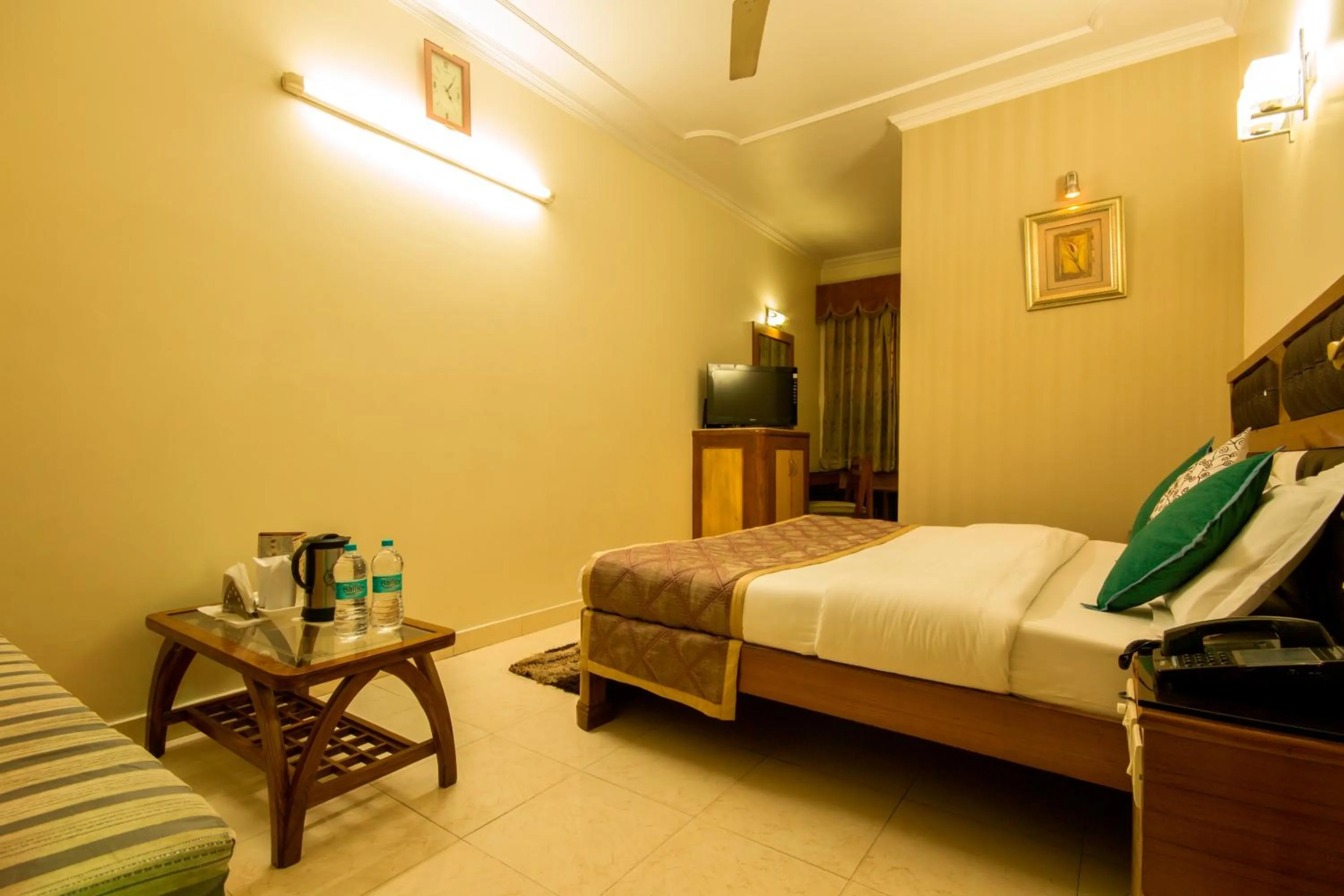 Photo of the whole room, Bed in The C Park Inn Karol Bagh Homely Atmosphere