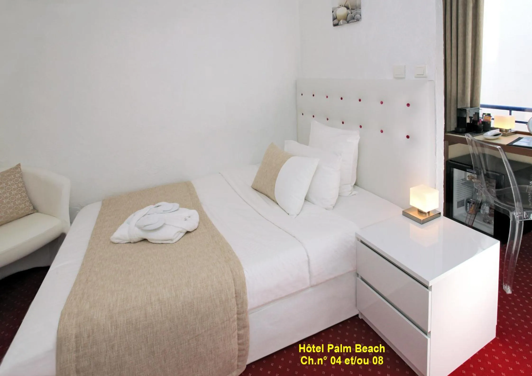 Bed in HOTEL PALM BEACH