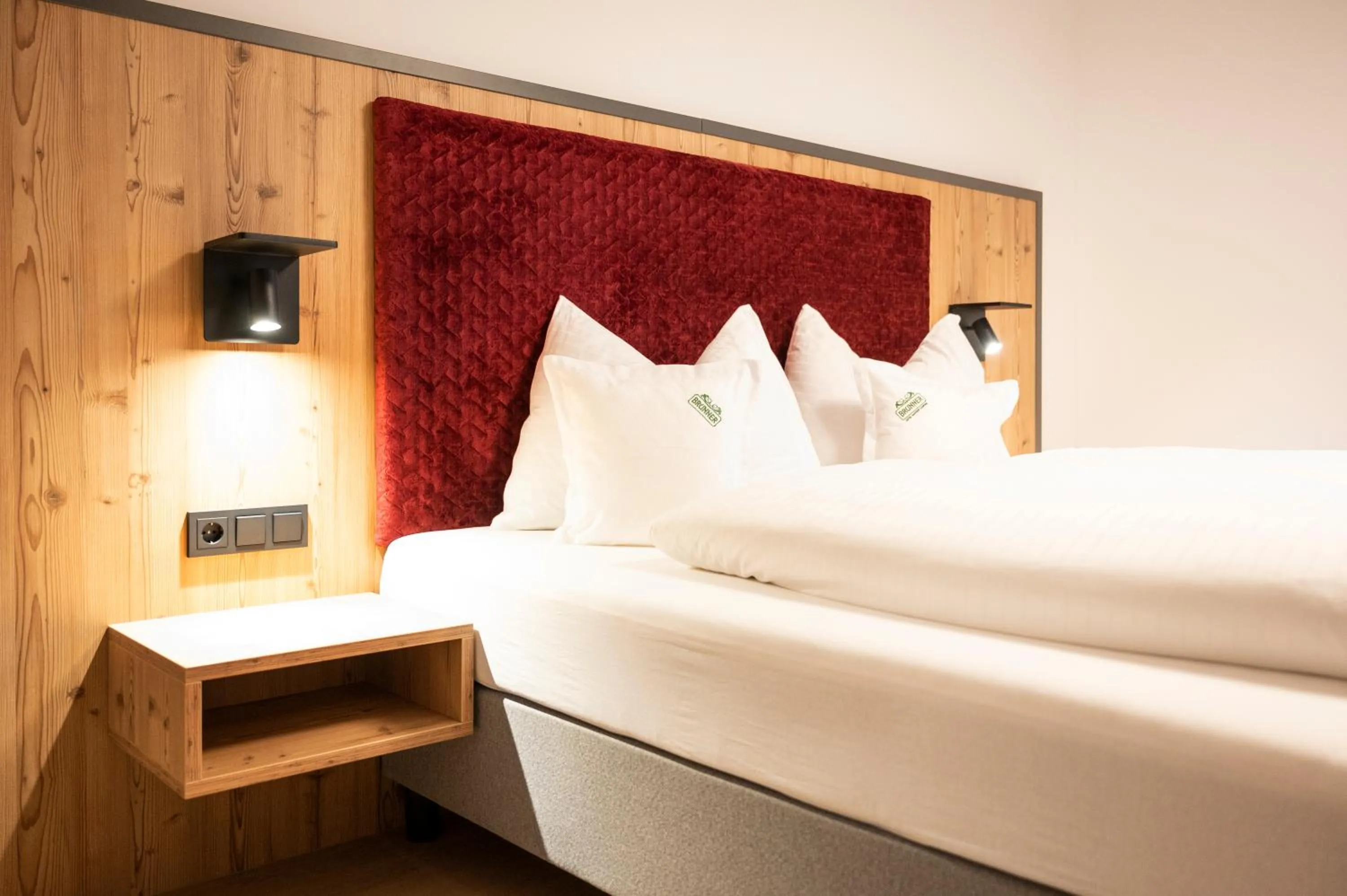 Bed in Hotel Brunner - Reiteralm