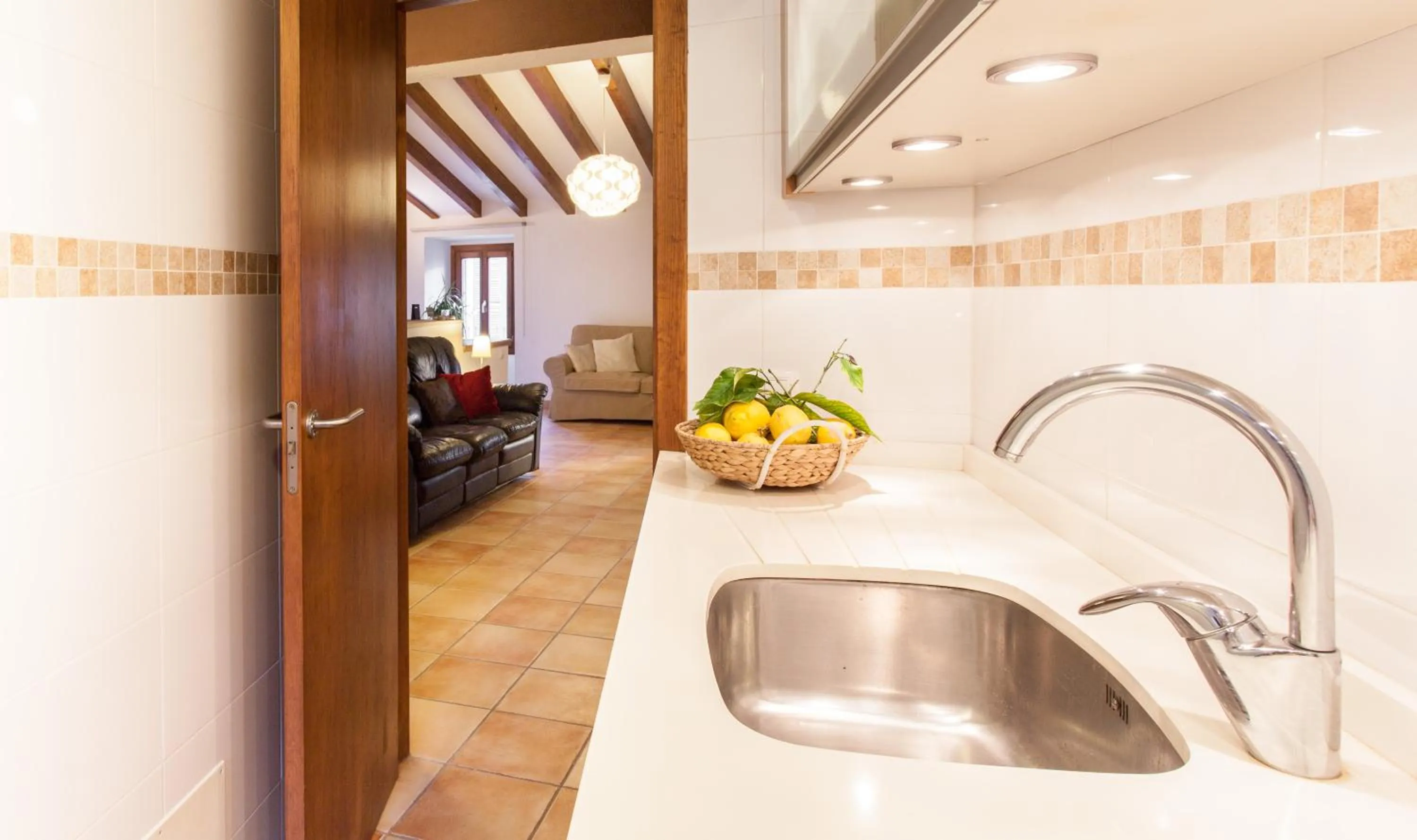 Kitchen or kitchenette in Petit Hotel Alaro