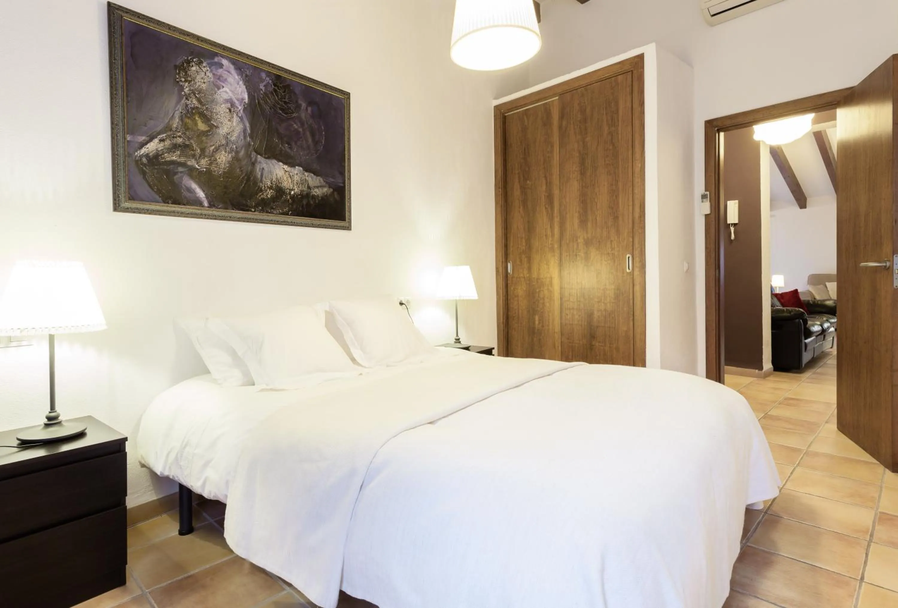 Bed in Petit Hotel Alaro