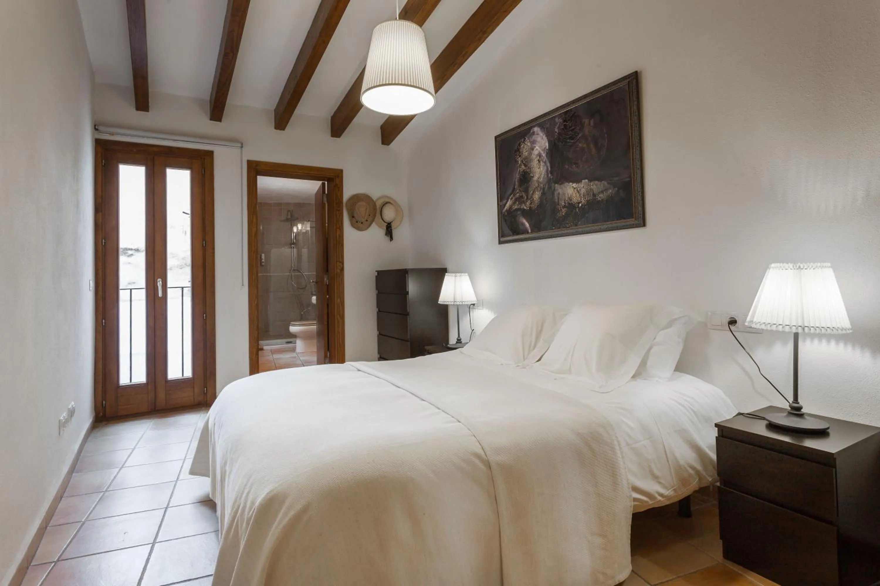 Bed in Petit Hotel Alaro