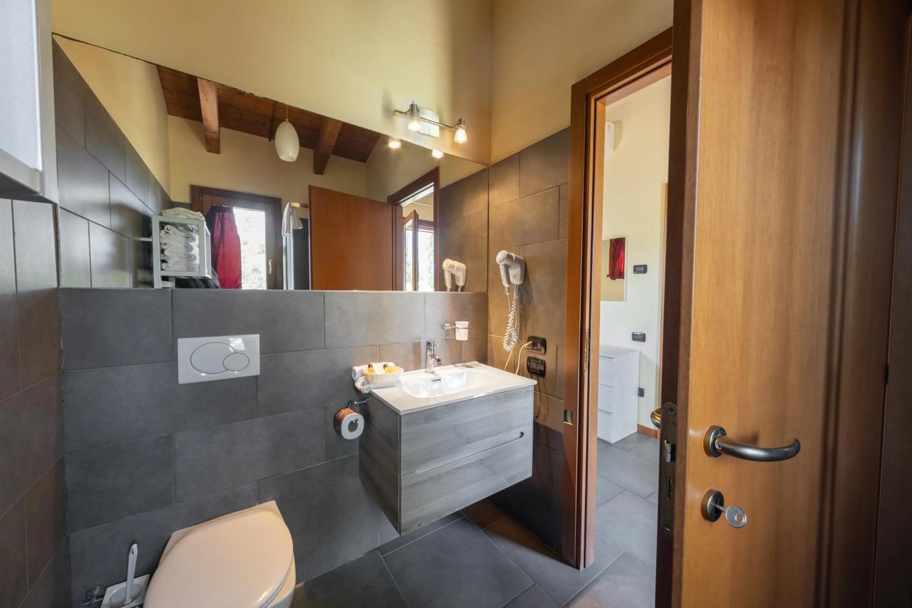 Bathroom in La Valle Dei Caprioli Village Bungalow Park - Freelandia Azienda Agricola