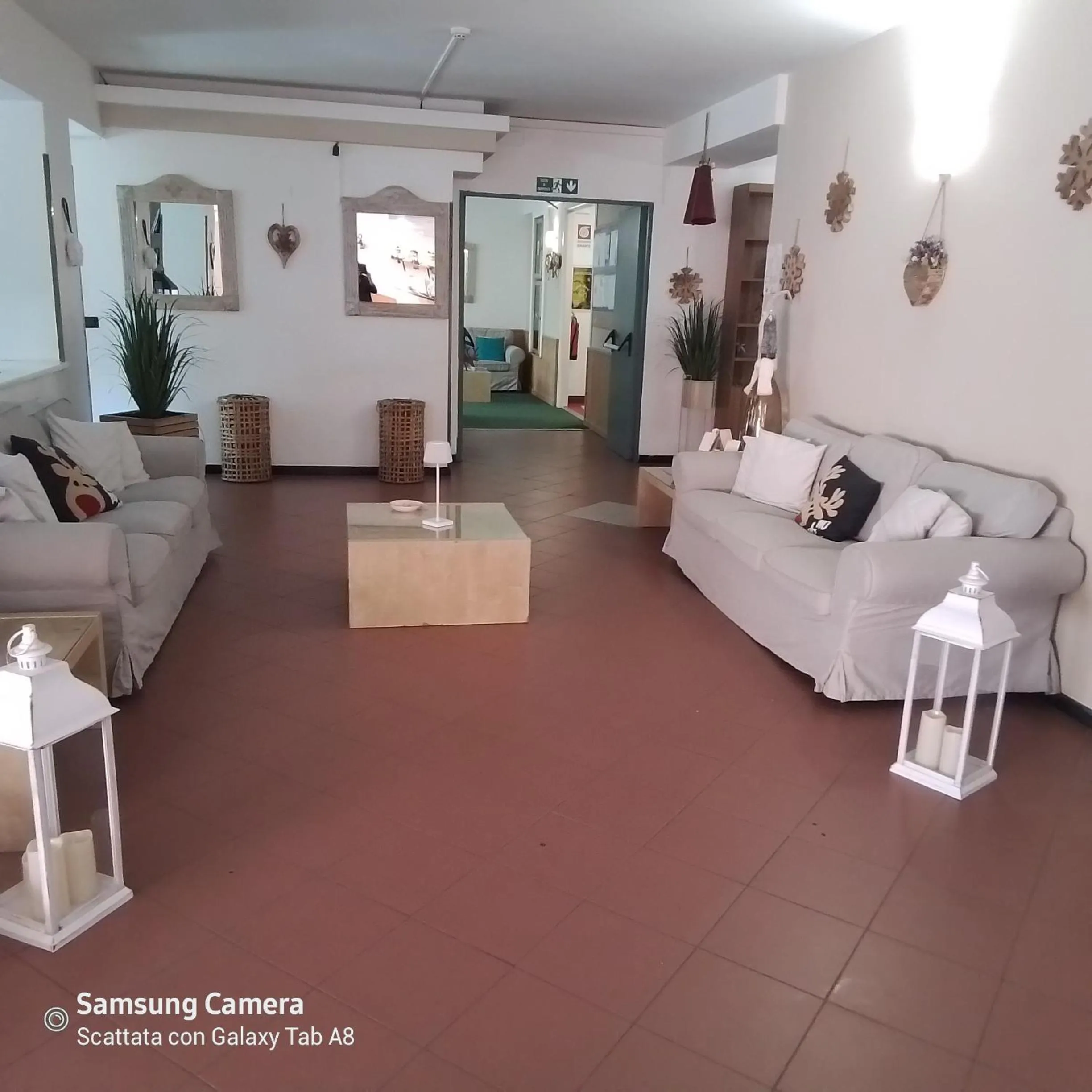 Communal lounge/ TV room in Life Hotels Des Alpes