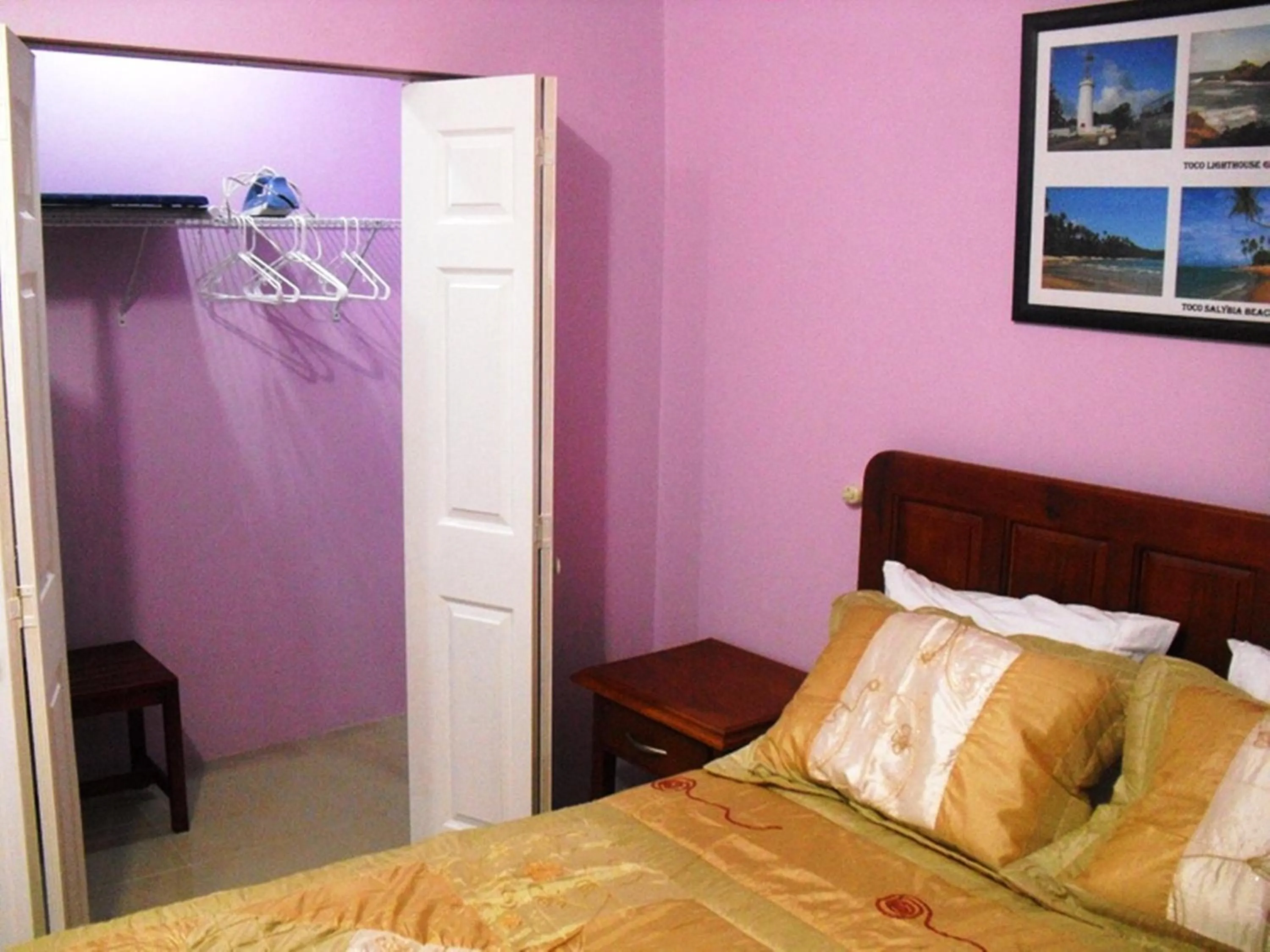 Bathroom, Bed in Piarco Village Suites