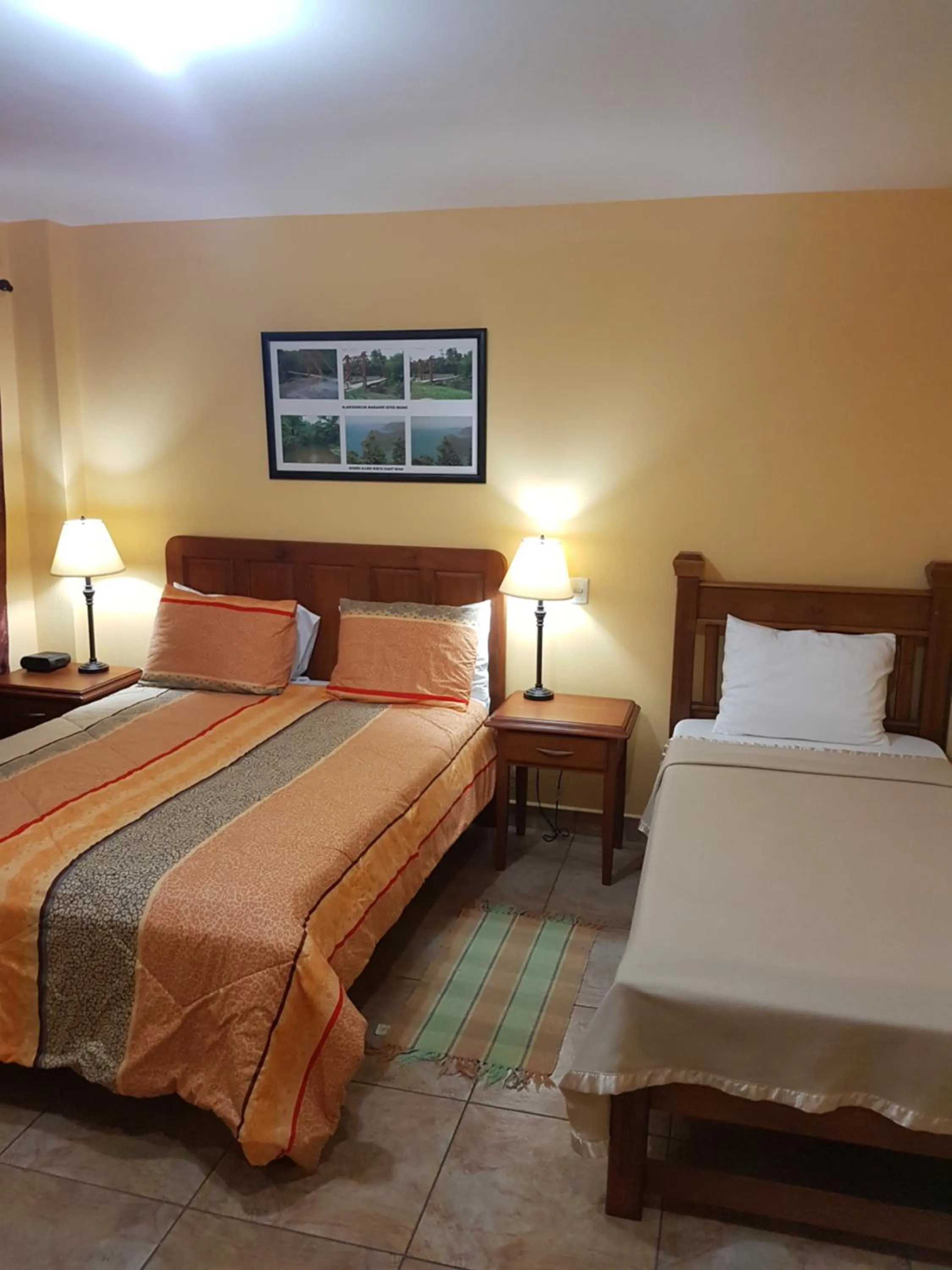 Bed in Piarco Village Suites