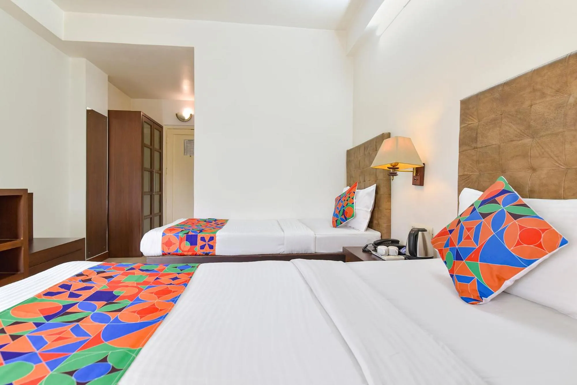 Bed in FabHotel Shikha