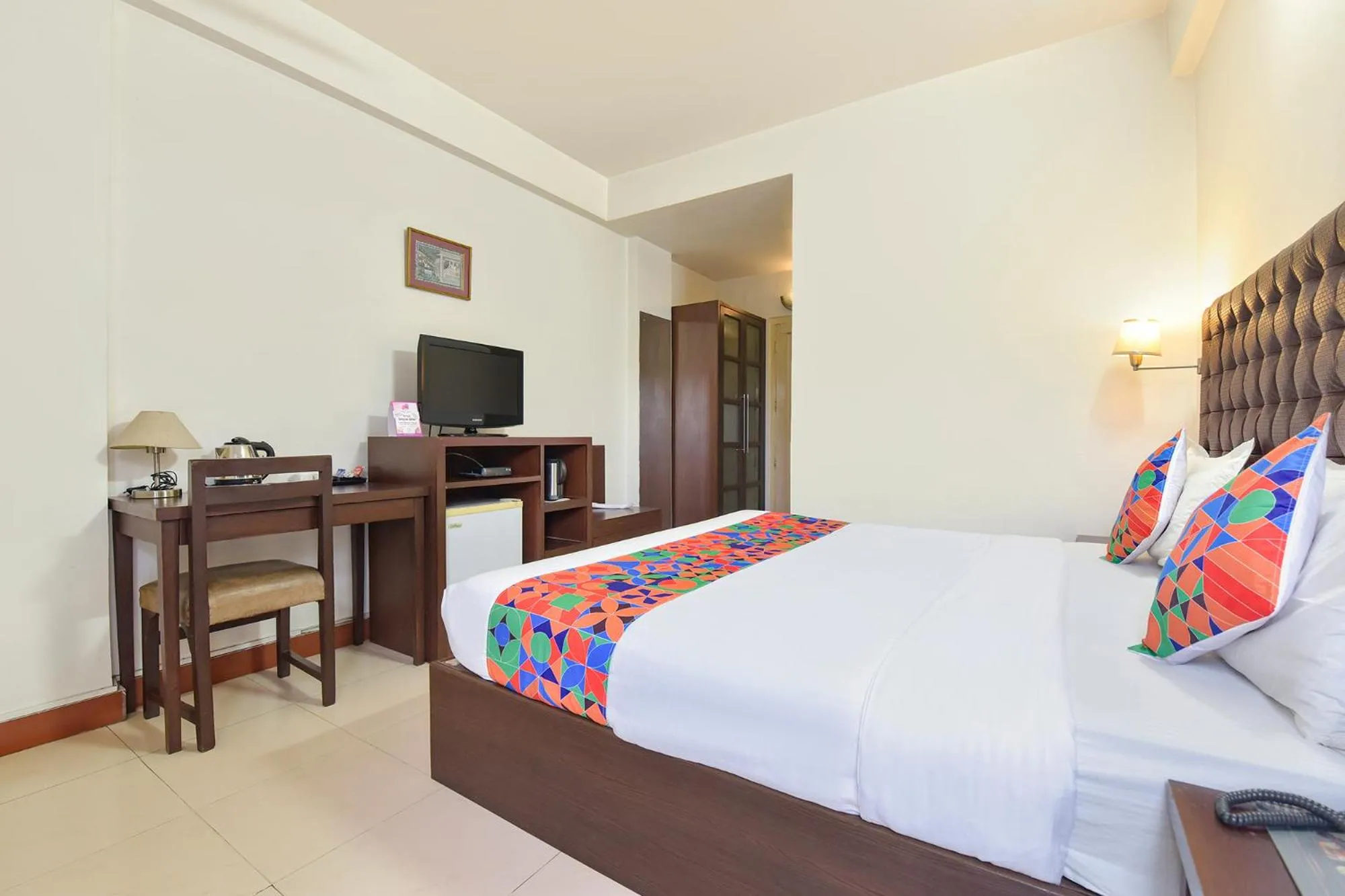 Bed in FabHotel Shikha