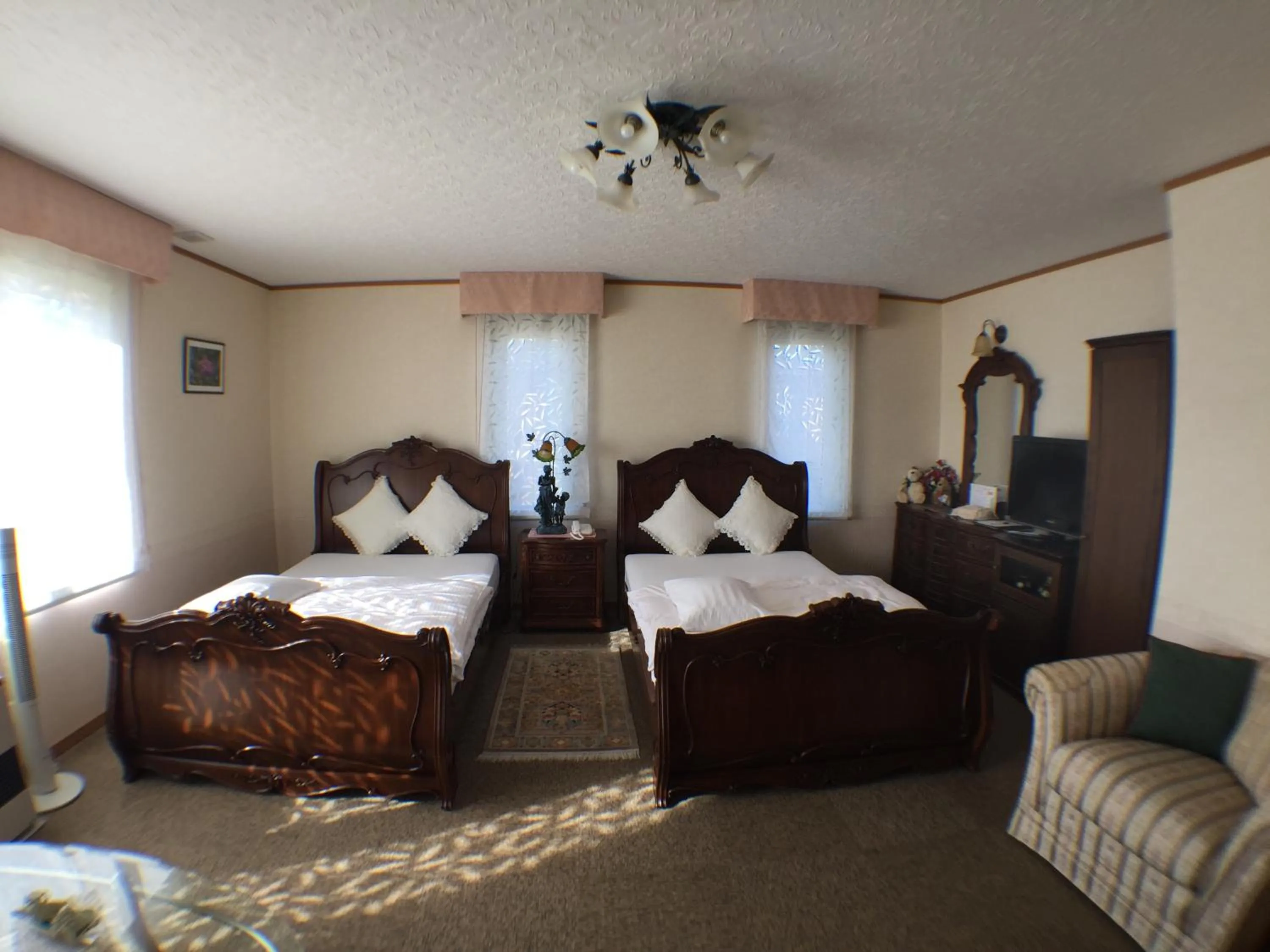 Bedroom in Petit Hotel Corinthian