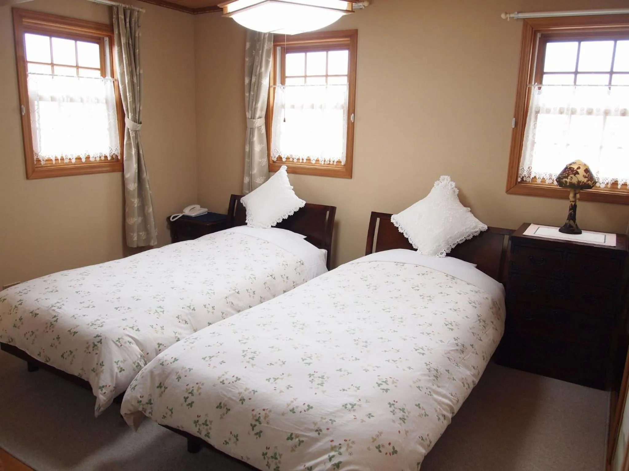 Bed in Petit Hotel Corinthian