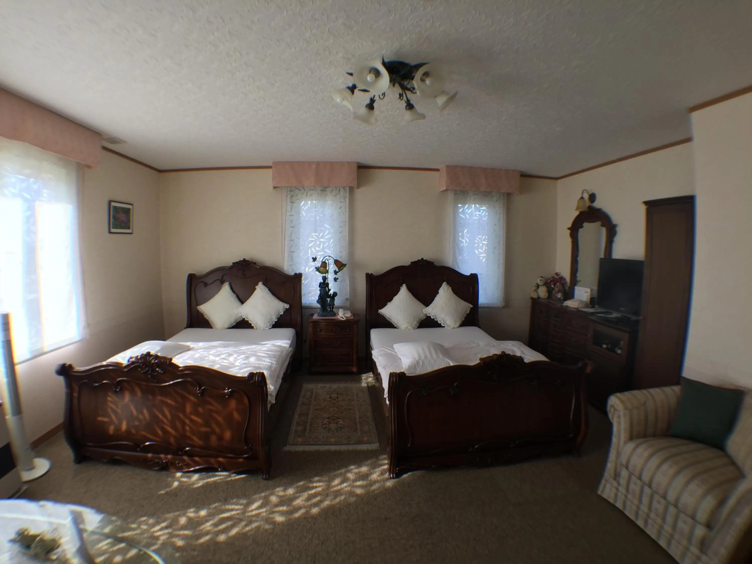 Bedroom in Petit Hotel Corinthian