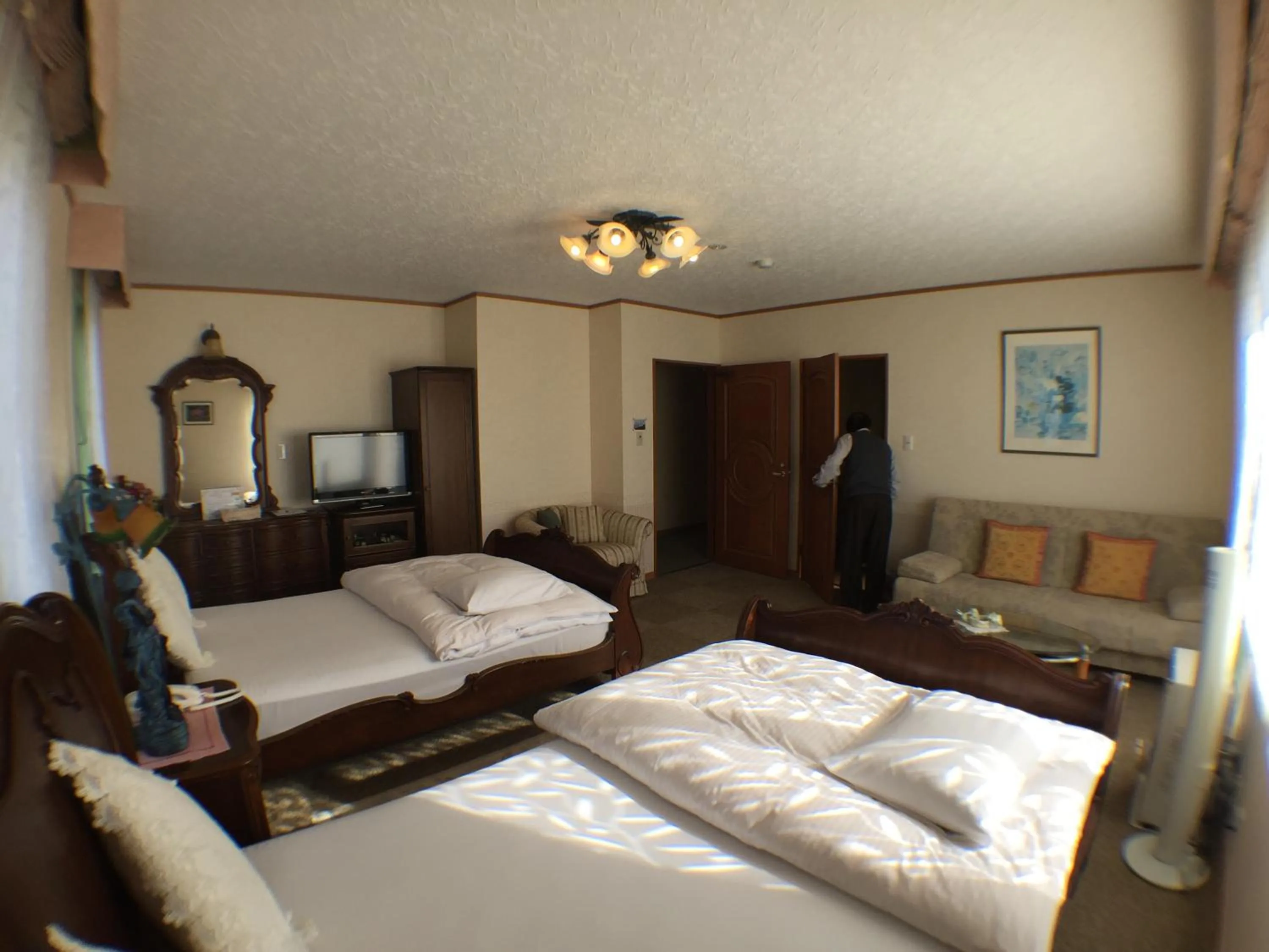 Bedroom in Petit Hotel Corinthian